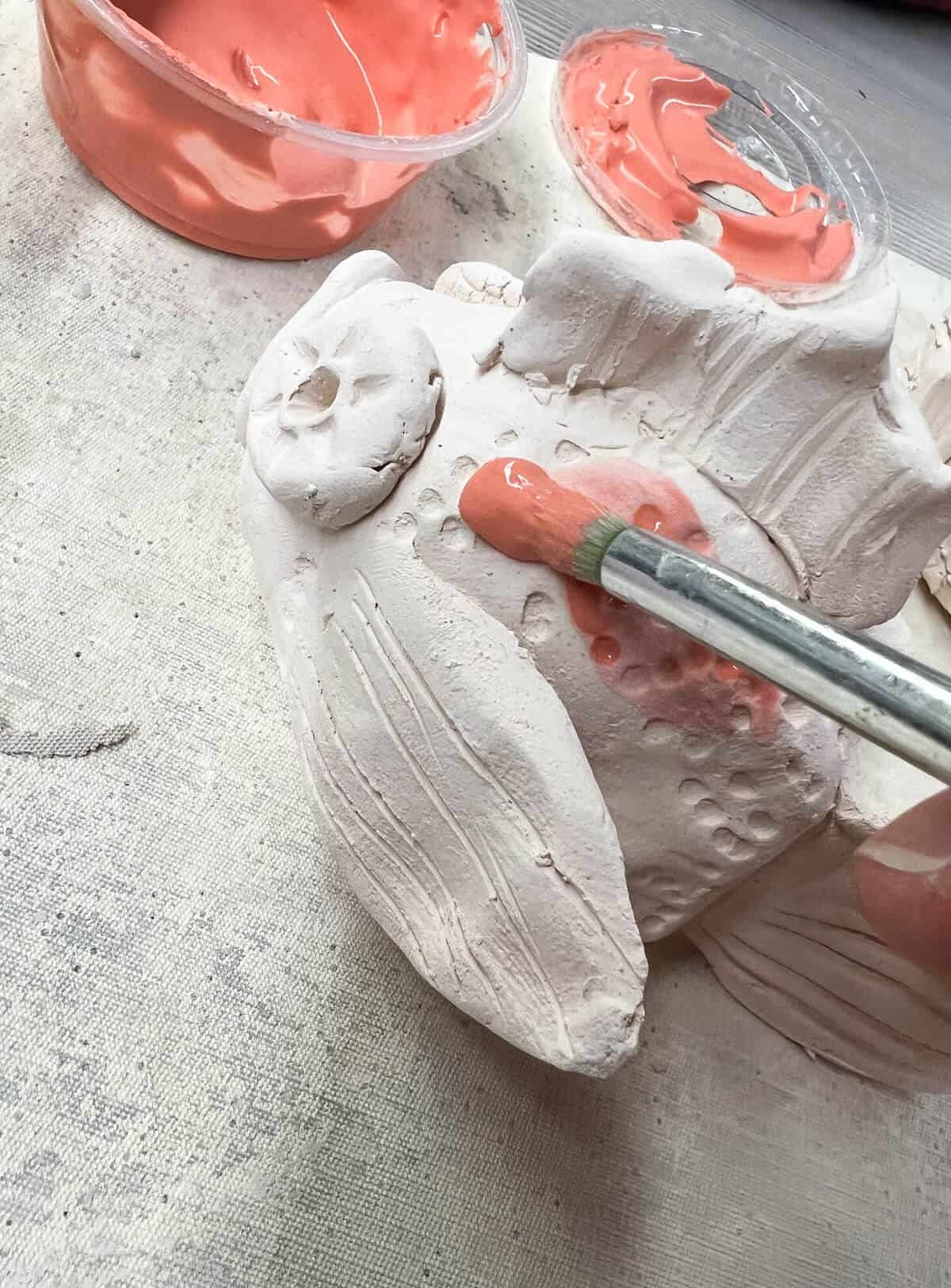 orange-glaze-on-clay-fish.jpeg