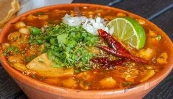 A bowl of menudo for Mexican food delivery at El Pollo Grill near La Mesa, CA.