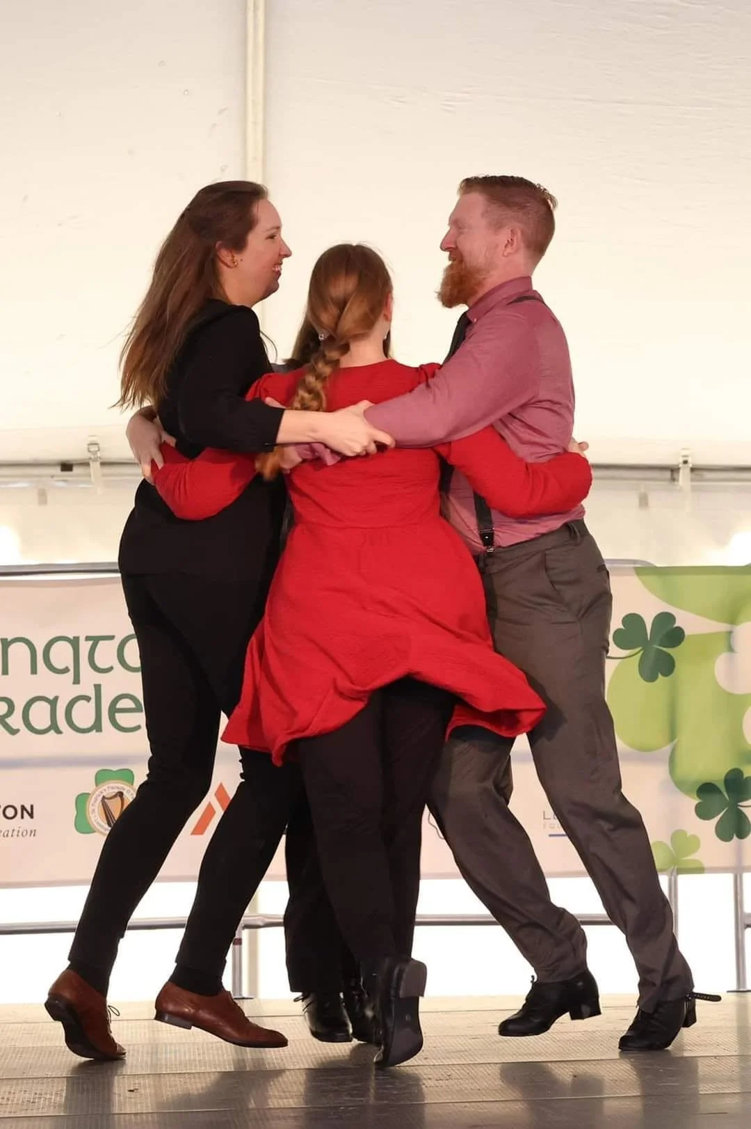 Miranda and friends dancing a "Christmas" (also known as a "swing four" or "basket" in various dance traditions) at the Lexington St. Patrick's Day Festival