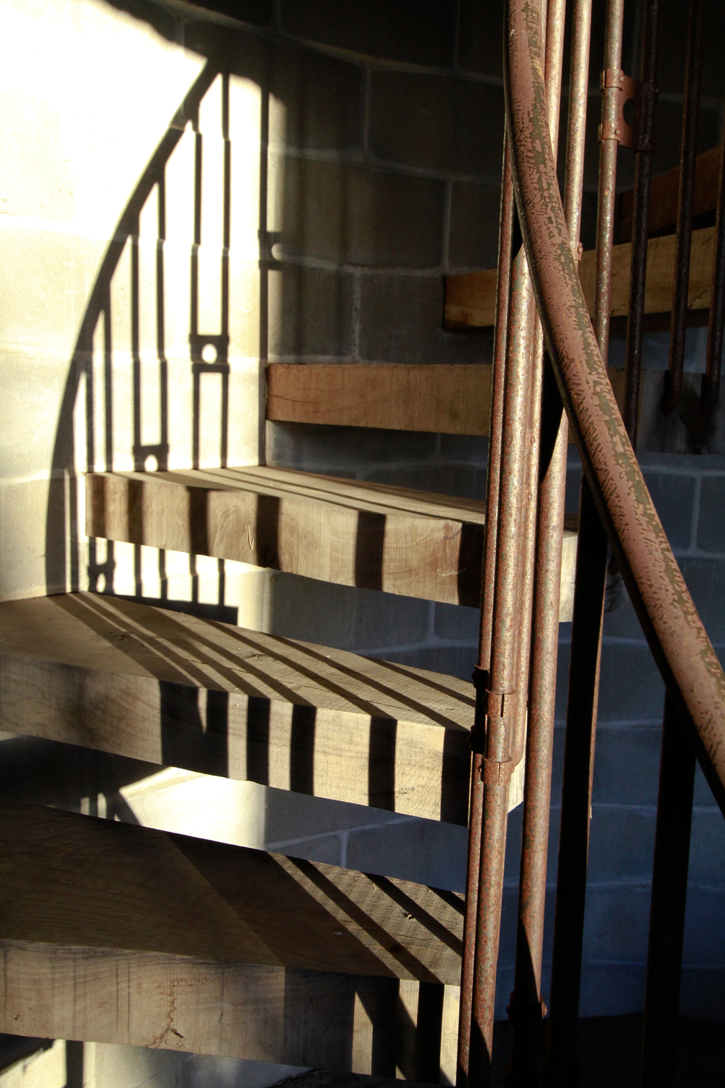 close up of spiral staircase on interior of Silo built of carved bricks