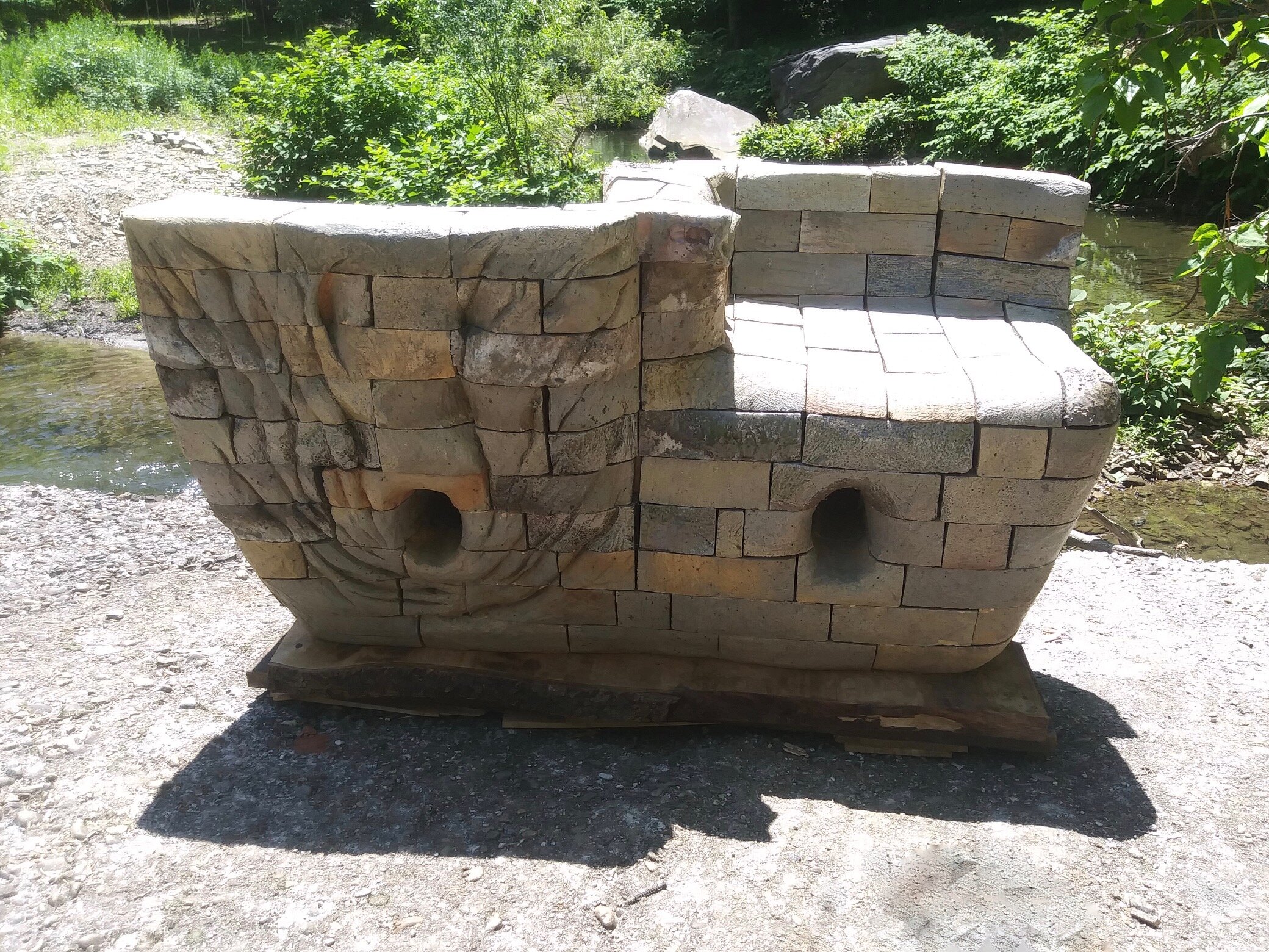 Tete a Tete or Salt Bench-Salt fired garden bench, here installed next to stream