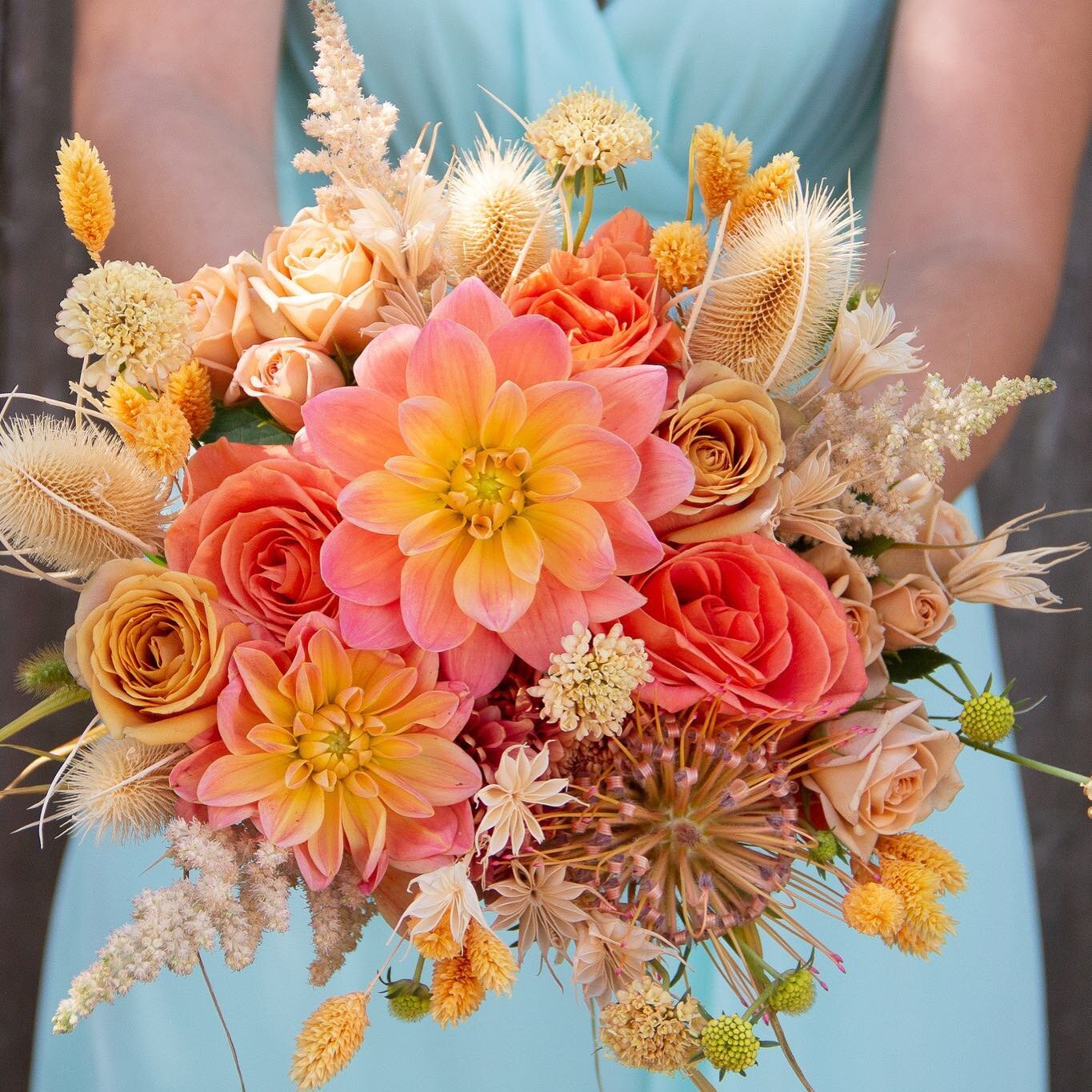 Desert sunset inspired bouquet for a back yard wedding today. Congratulations @britkelly88 ! We had so much fun putting this together and playing with the mix of fresh and dried elements. I hope your day is magical! #bridalbouquet #microwedding #dese