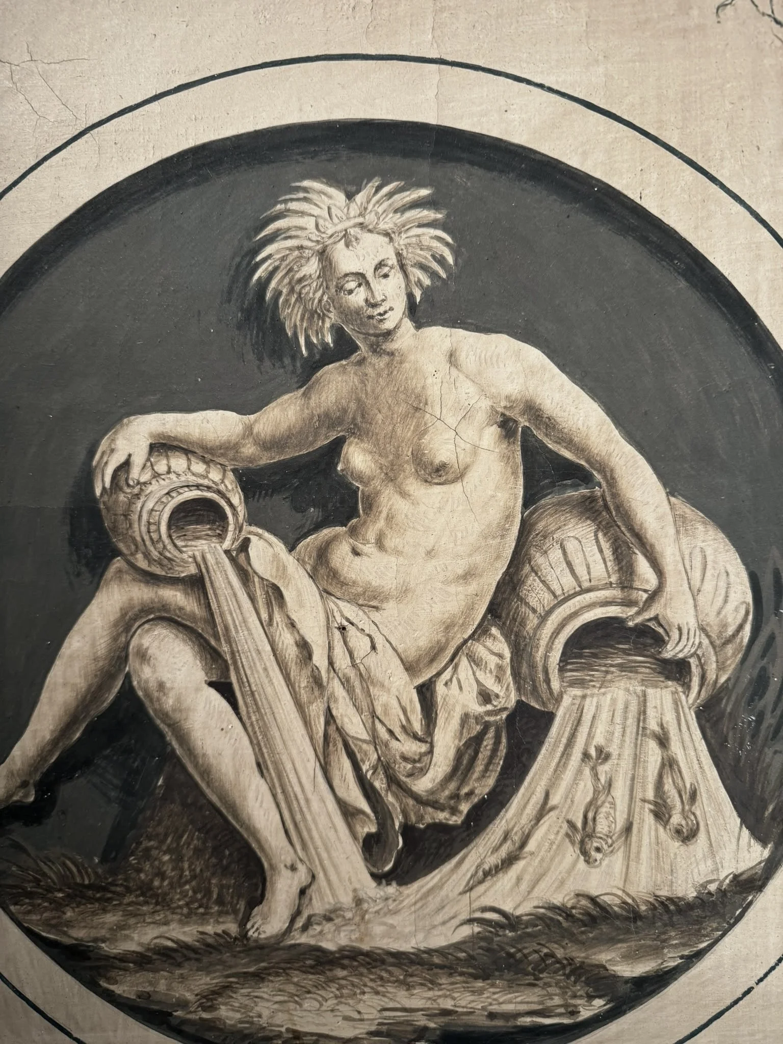 Monumental late 18th-century Italian Neoclassical trumeau mirrors with pale green painted frames, gilded ornamentation, floral panels and exotic birds.