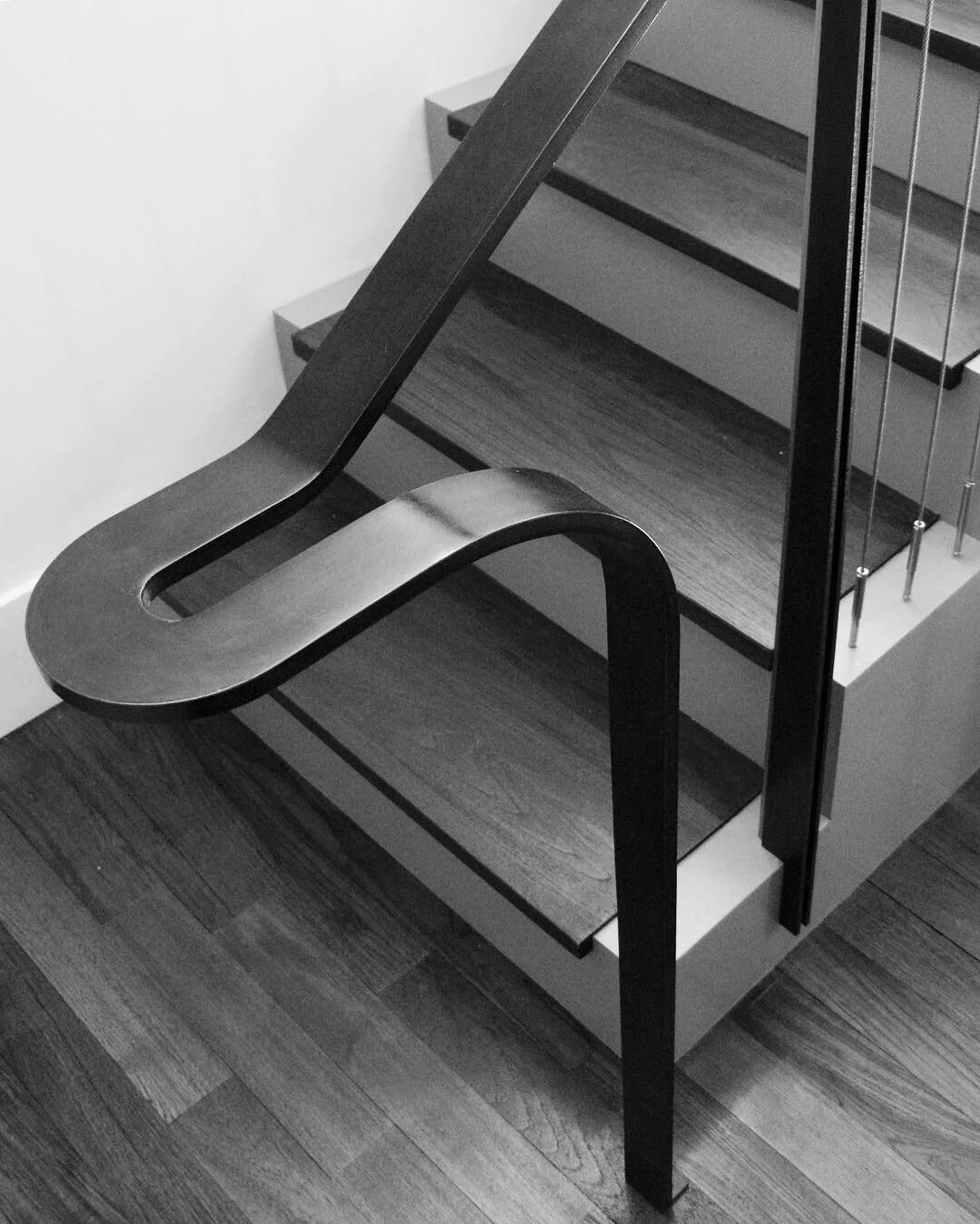 Steel handrail with stainless steel cable infill