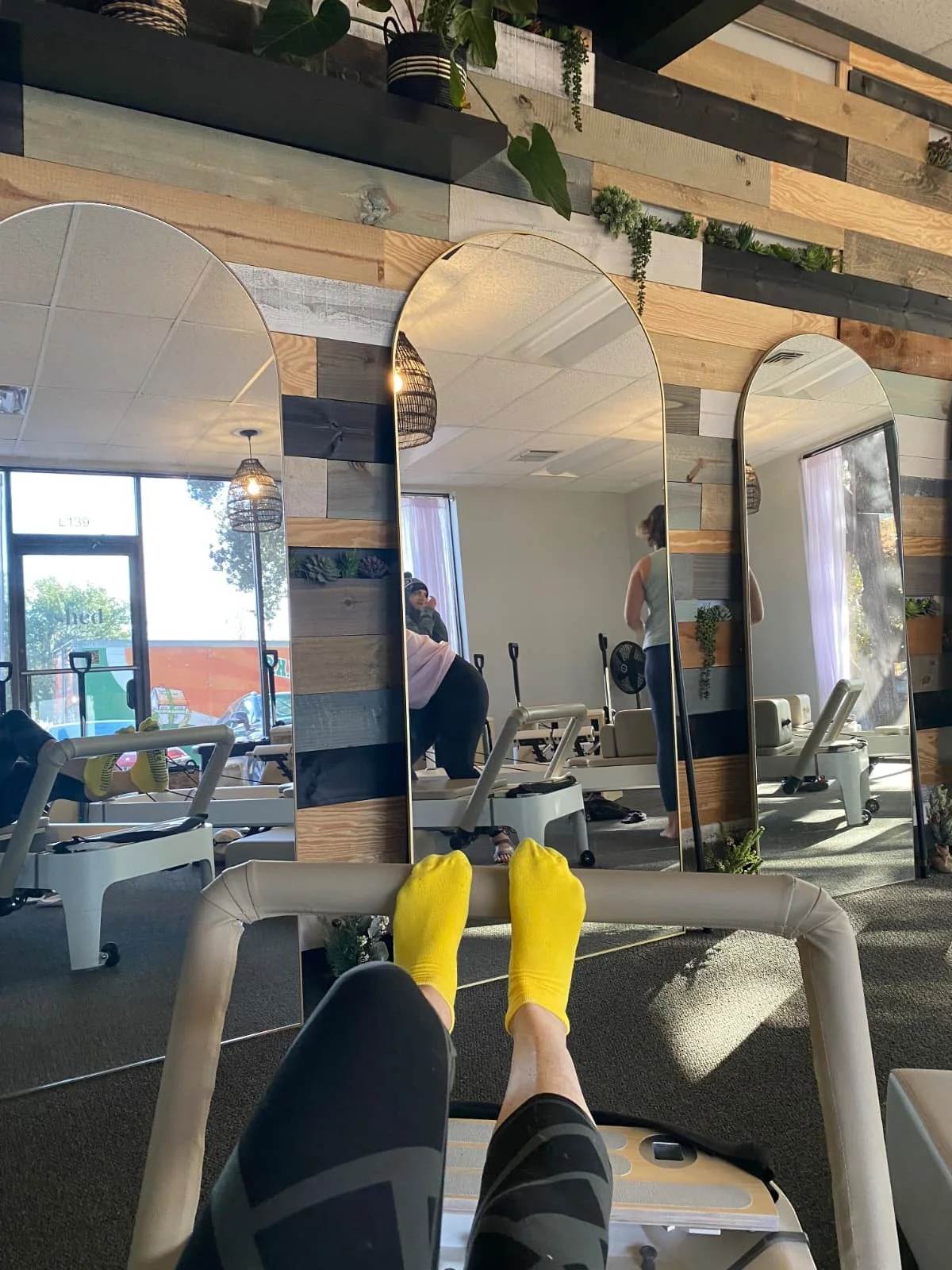 Feet in Shed Pilates and Fitness sticky grip socks.