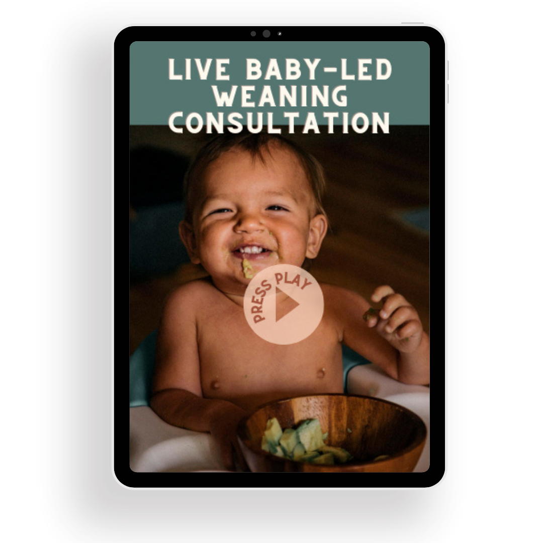A baby sitting in a high chair with a bowl of diced avocado, smiling and holding a piece of avocado, with text indicating a live baby-led weaning consultation and a play button overlay.