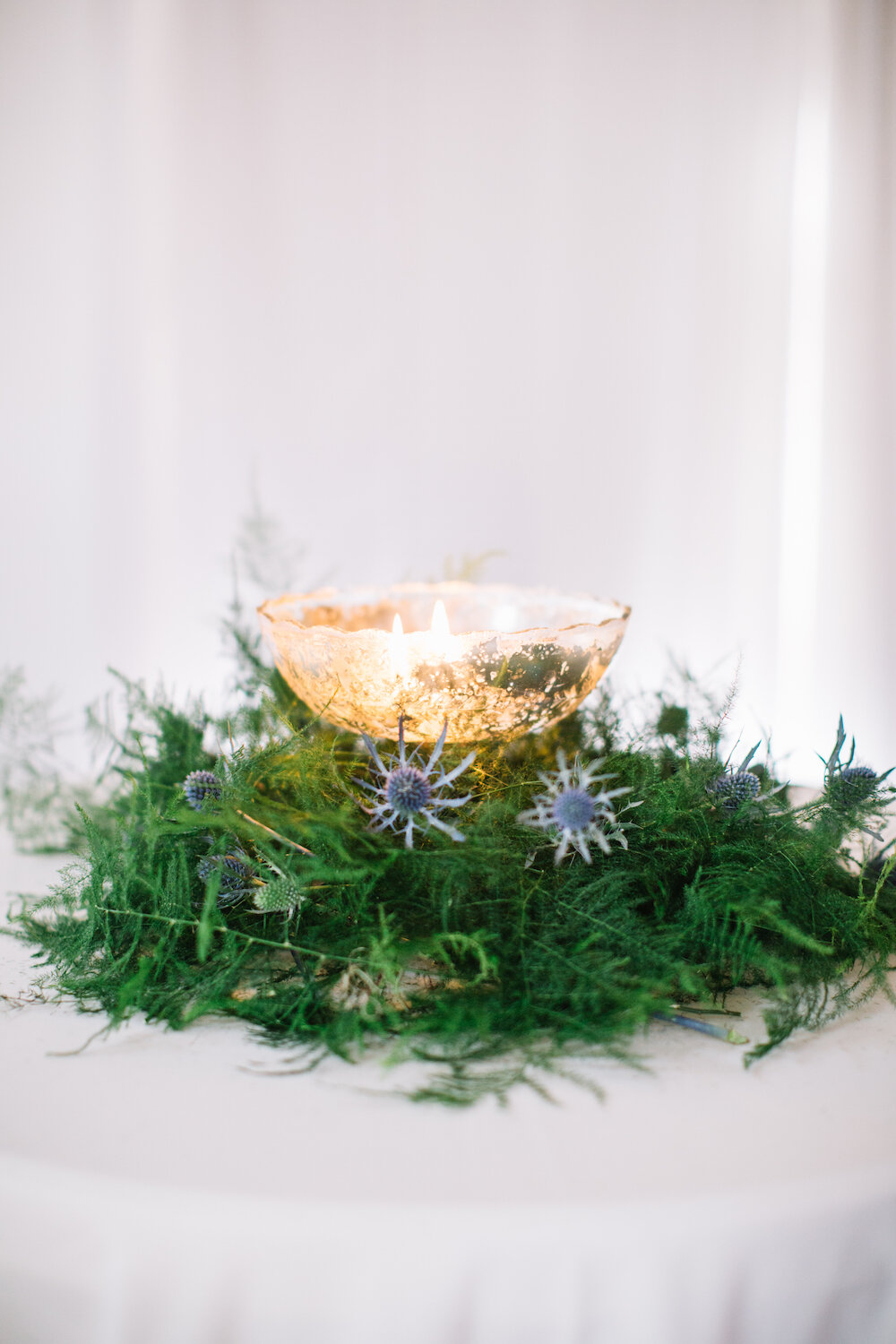 Blue Thistle &amp; gold candle holders make a beautiful centerpiece.