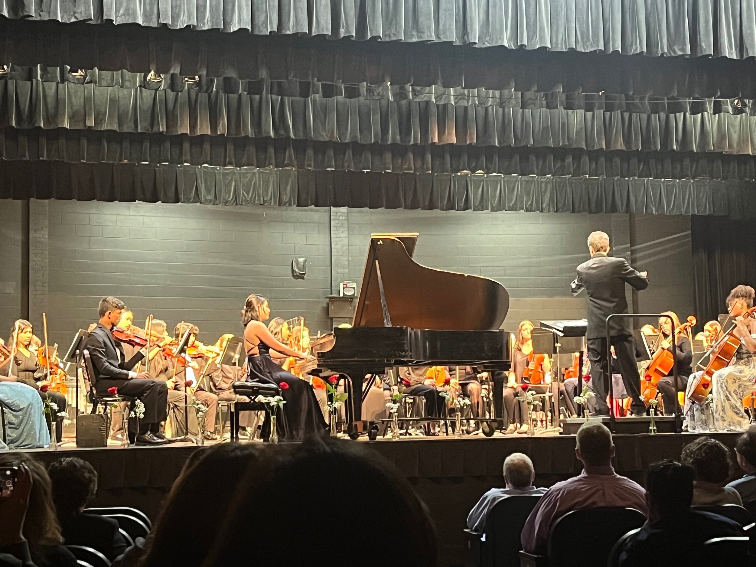  FPS student, Briana, performing the Saint-Saens Piano Concerto with the Arlington High School Orchestra. 