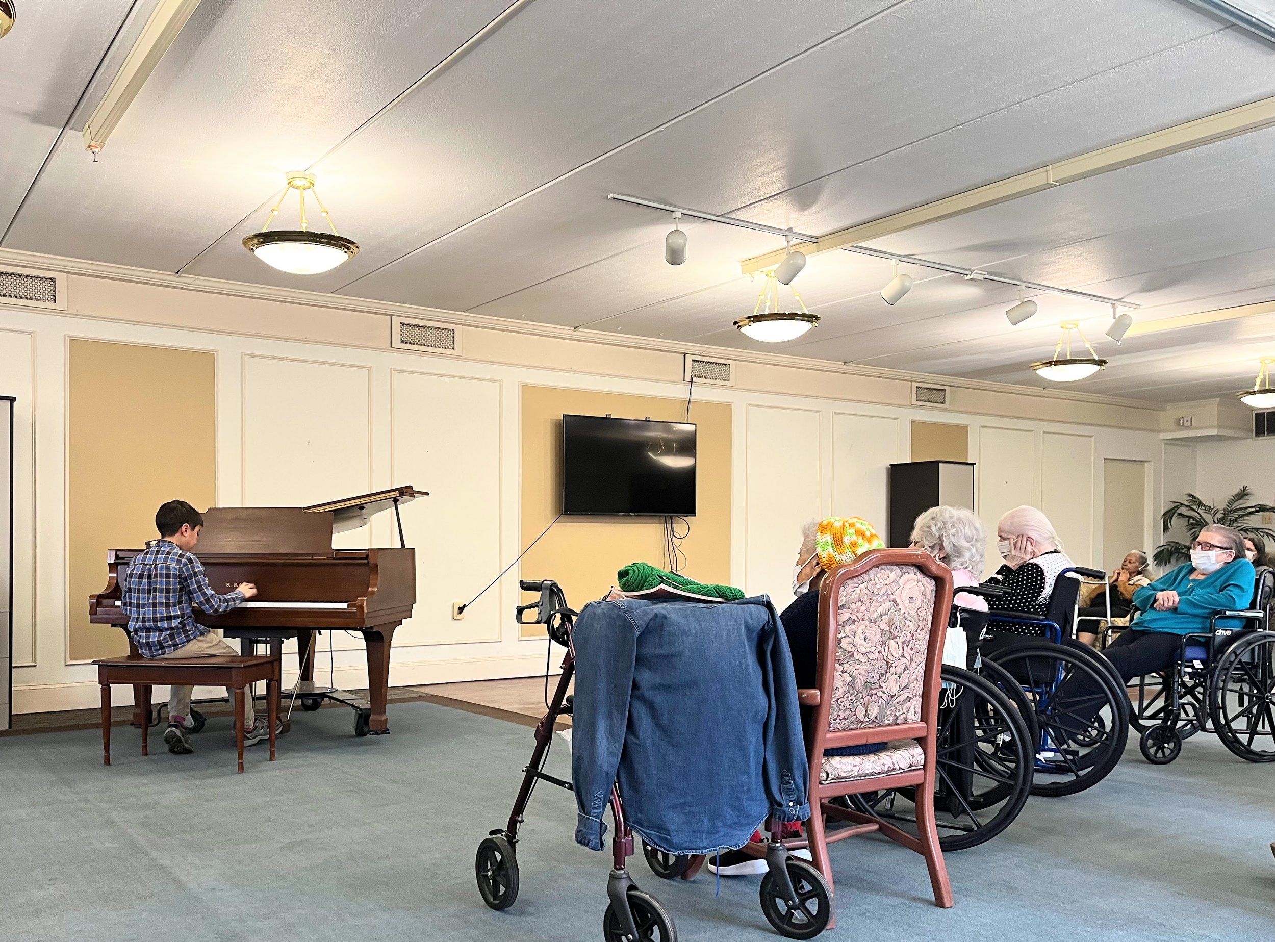  FPS Student, Sebastien, performing in an outreach concert at The Fishkill Center for Rehabilitation and Nursing 