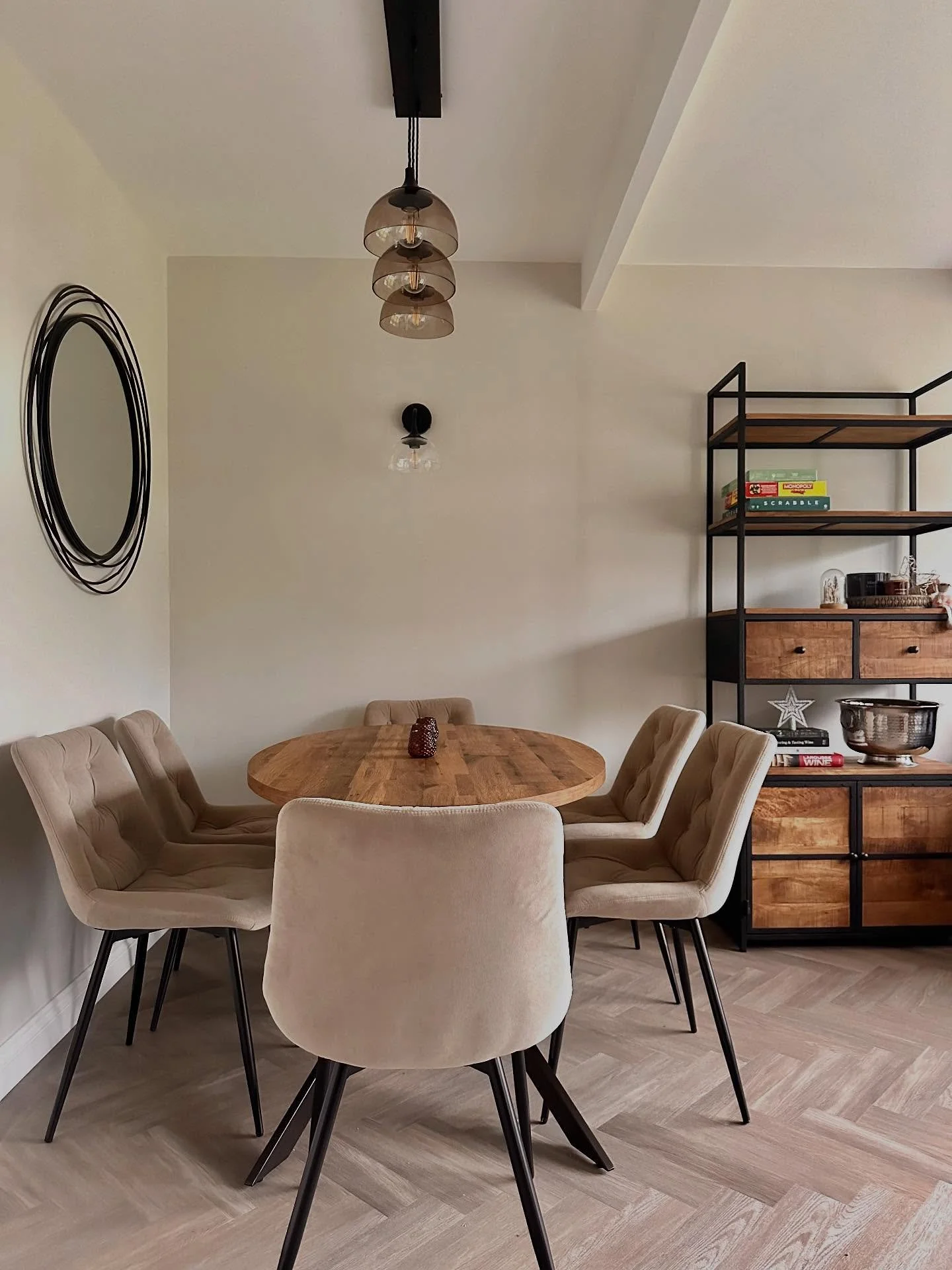 This was a lovely project I worked on this time last year, a refresh of a family dining room. My clients wanted the space to feel more welcoming, functional and of course beautiful. 

Their style was an industrial glam and the warm neutrals paired wi