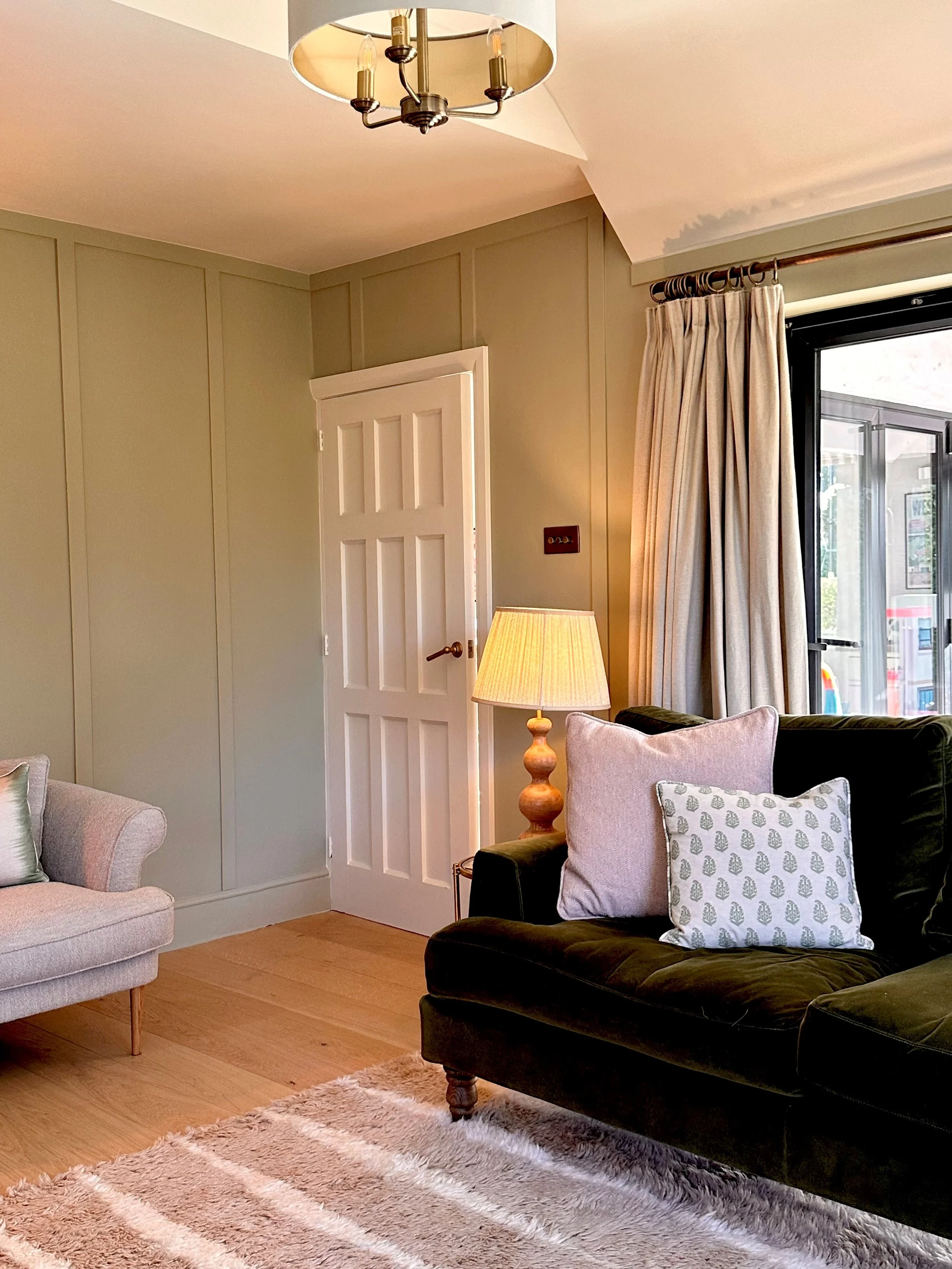 interior designed living room, cosy, warm, green, english countryside