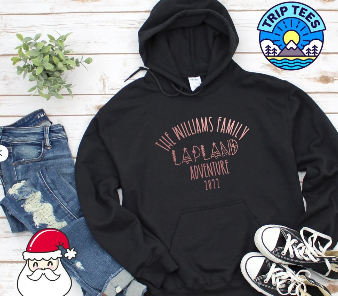 Personalise me! Childrens or Adults Family name Lapland adventure 2023 hoodie/ Sketch design / Black or navy hoodie with rose gold print