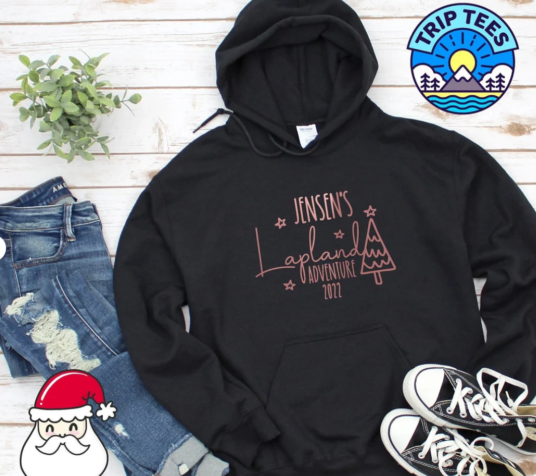 Personalise me! Childrens or Adults name Lapland adventure 2023 hoodie/ New doodle design / Black or navy hoodie with rose gold print