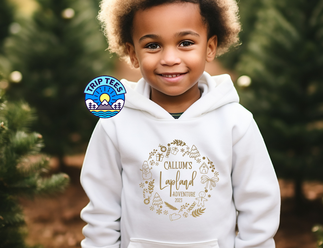 Personalise me! Childrens and Adults Lapland adventure® white or black hoodie / gold or rose goldChristmas wreath design