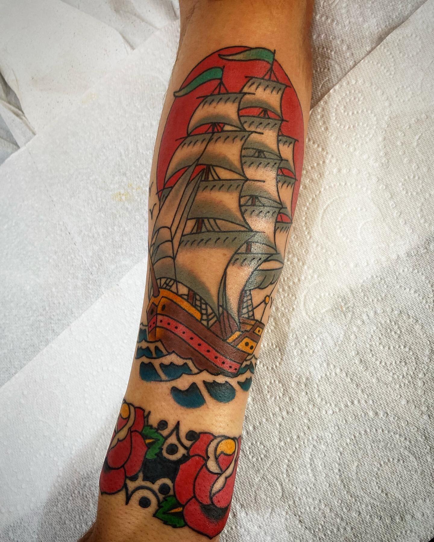 Cuff and a ship to start a sleeve. Tattooed by @olliemakestattoos