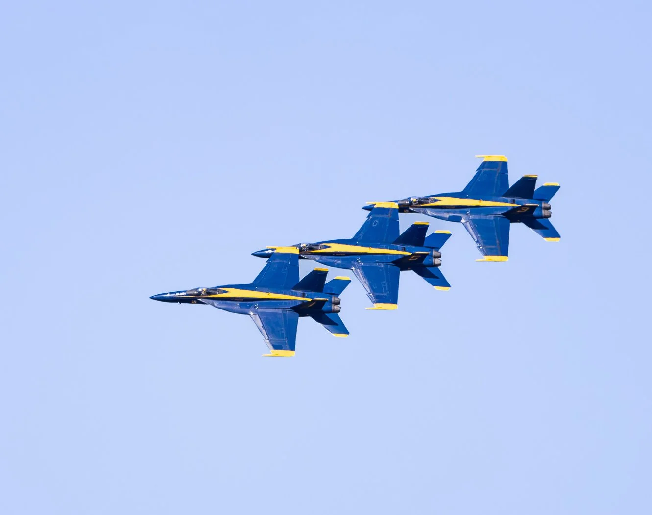 Three Blue Angel F18's flying in formation at the Thunder Over New Hampshire air show