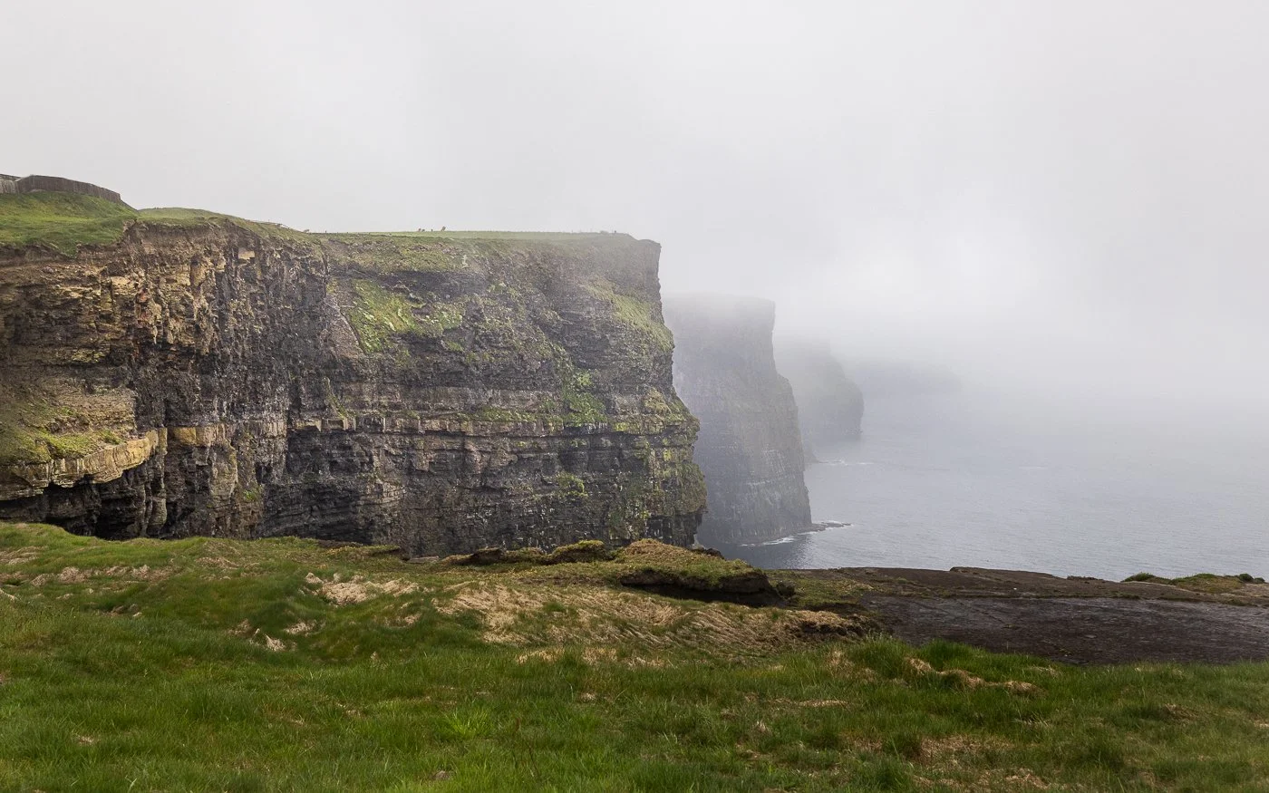 A misty morning at the Cliffs of Moher in Ireland