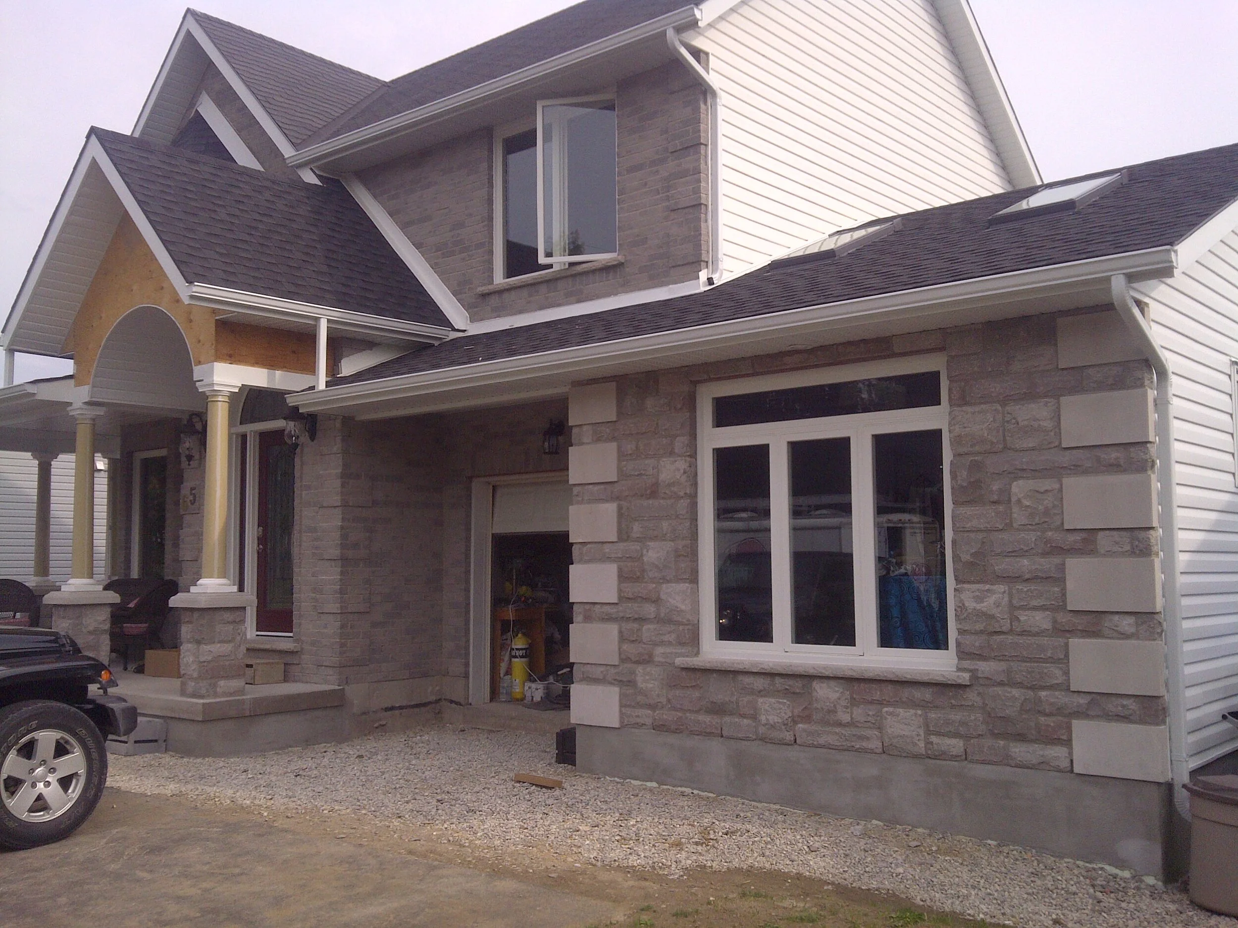  Addition: Front Veranda &amp; Side Family Room. 