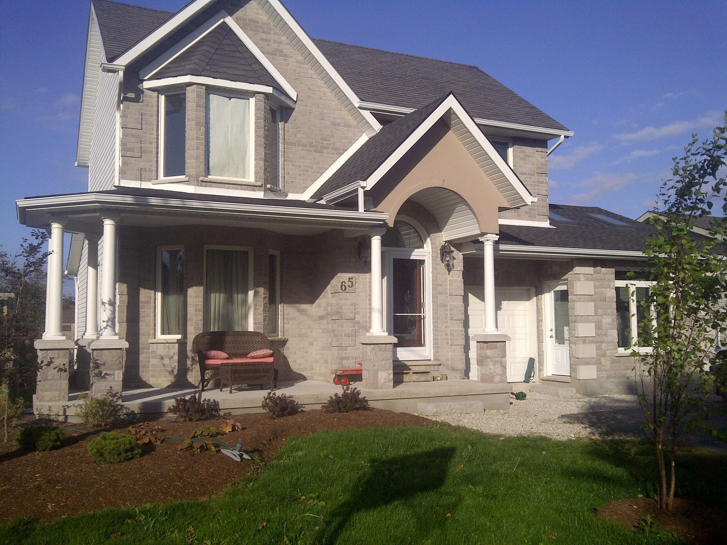 Addition: Front Veranda &amp; Side Family Room. 