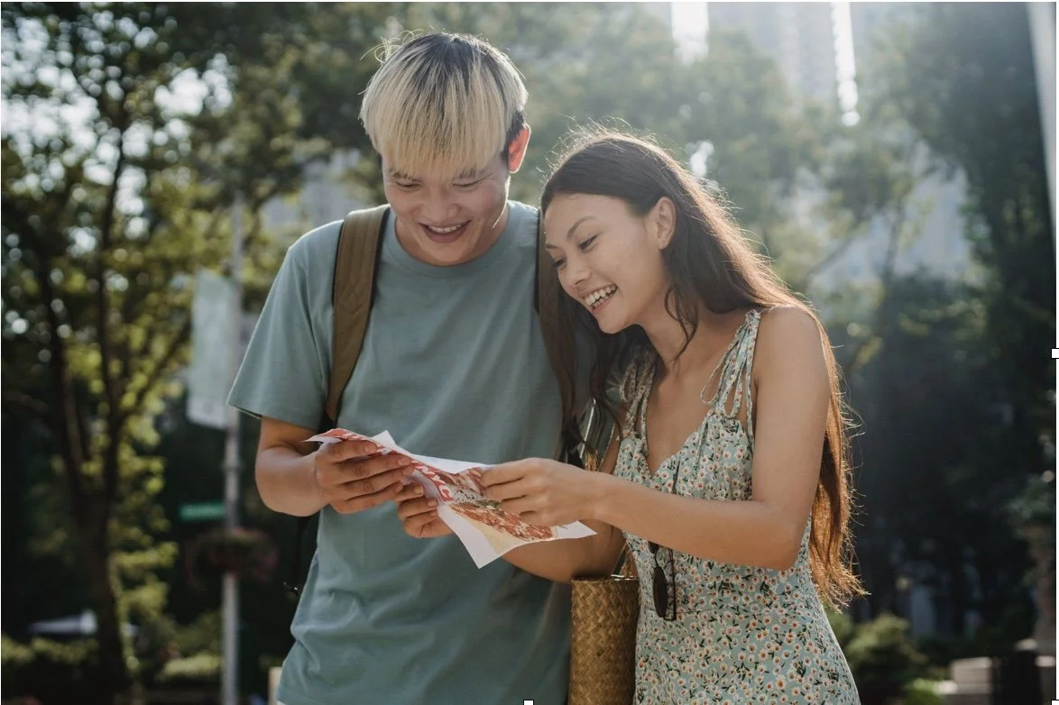 Joyful couple delighted by good news on paper