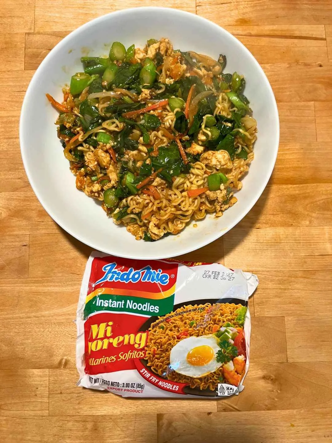 Pad See Ew inspired instant noodles made with Indomie Mi Goreng and fried tofu from Robin Ha’s cookbook.