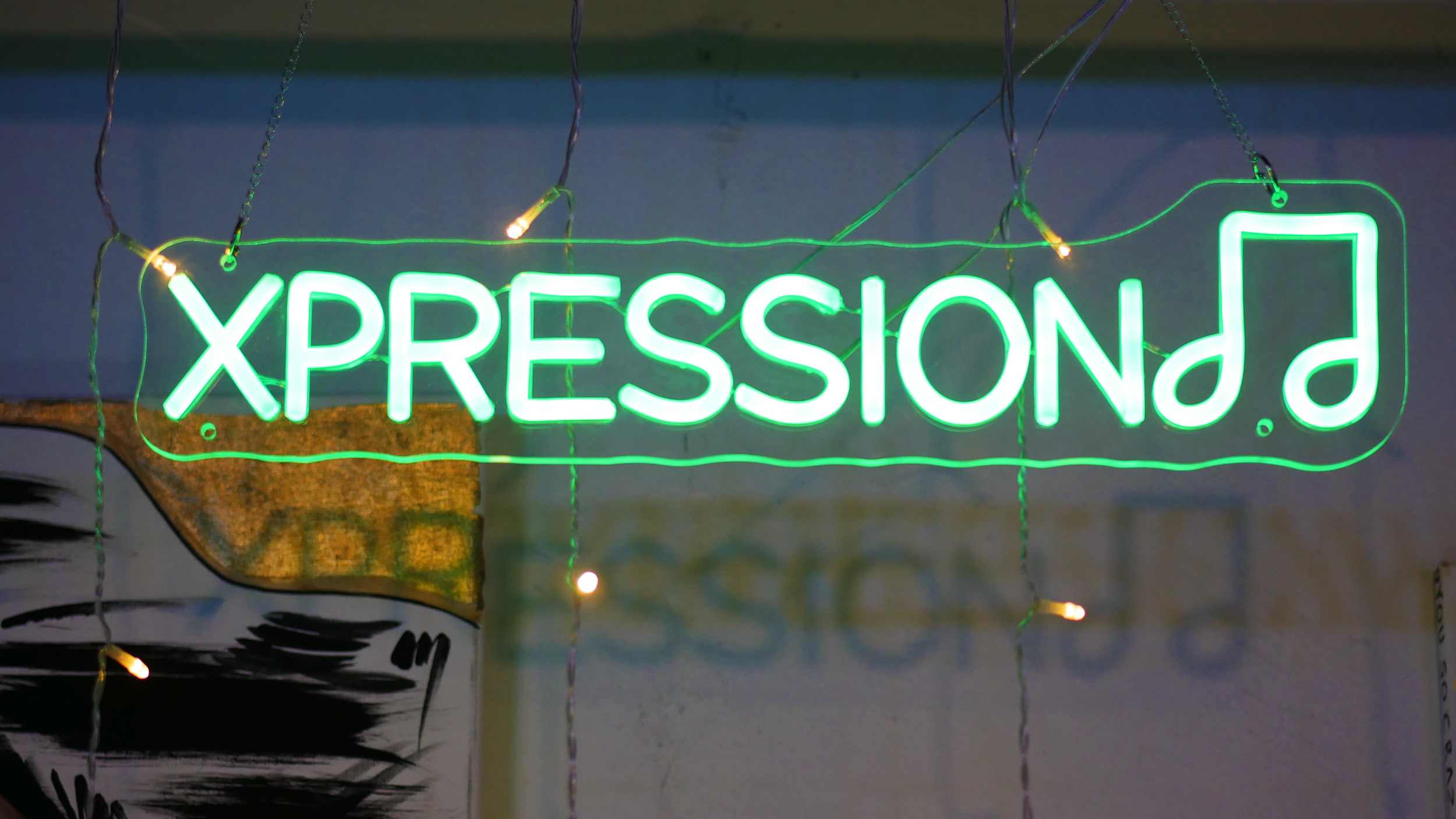 xpression sign.png
