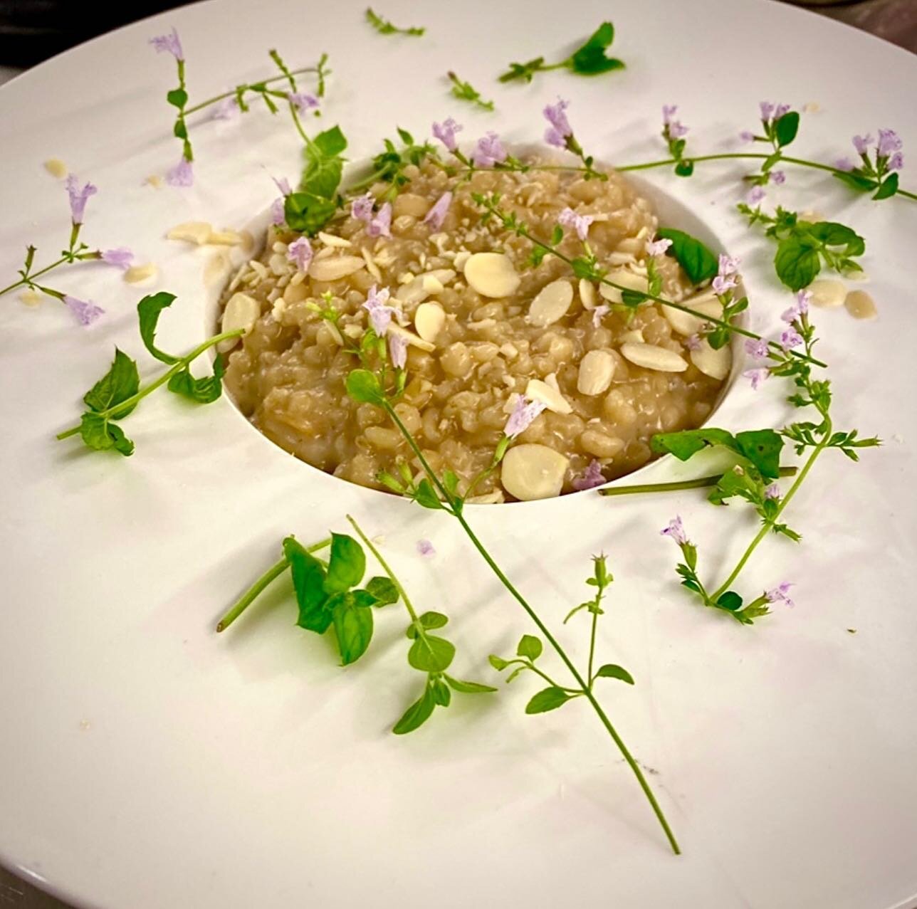 Barley Dessert Risotto with Slivered Almond &amp; Nepitella Blossoms

✔️Pressure cook barley in equal parts water and coconut milk

✔️Add whole spices like cardamom, vanilla bean &amp; cinnamon sticks

✔️Season with maple syrup &amp; top with almonds