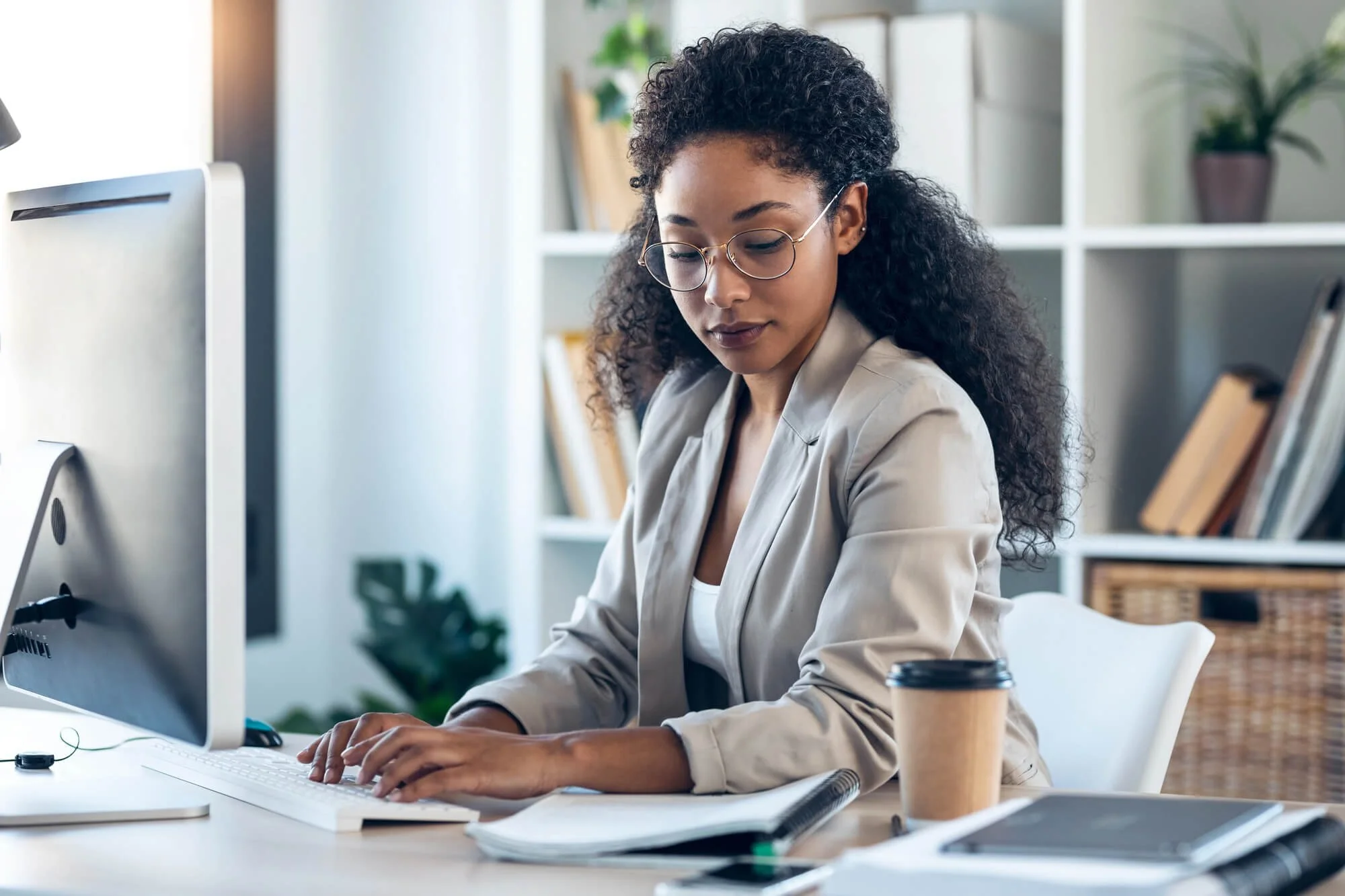 Professional woman navigating work-related stress, representing burnout therapy and mental wellness support in Dunwoody