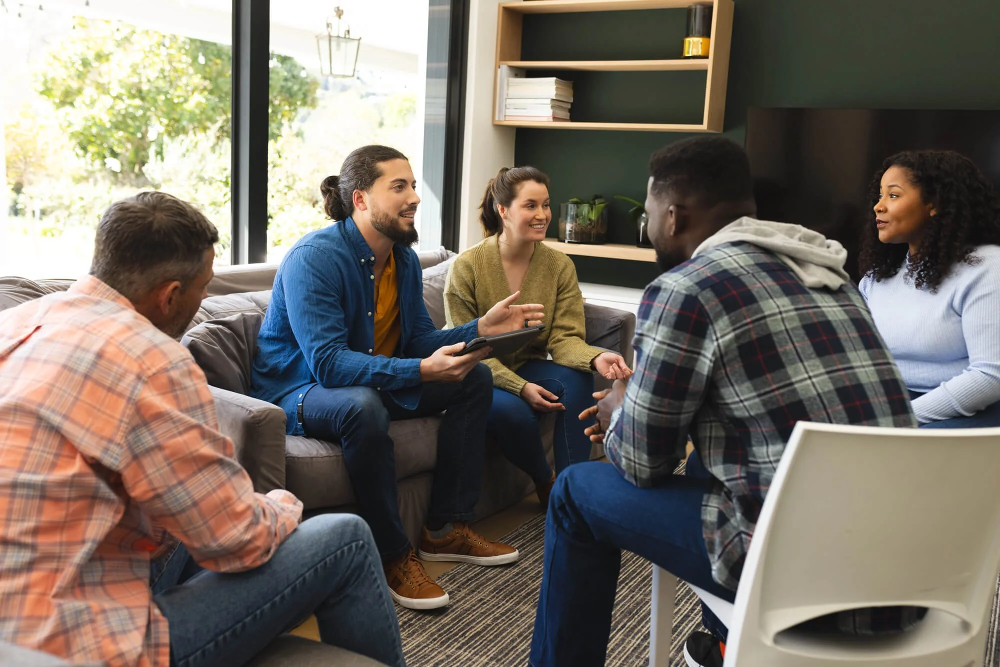Diverse clients participating in a supportive counseling session, helping individuals find the right therapist in Dunwoody