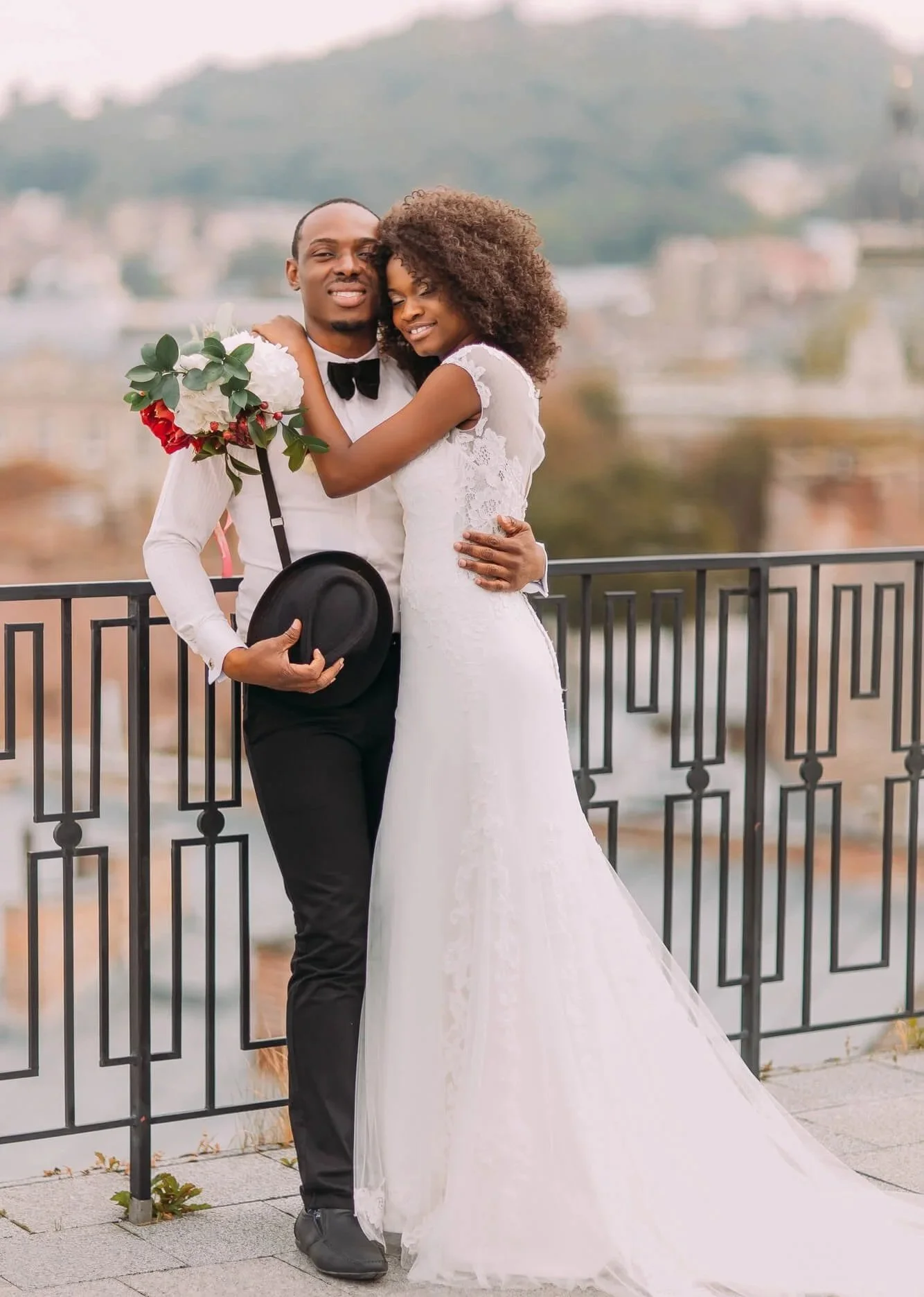 Newly married couple embracing on their wedding day, representing premarital counseling in Atlanta and Dunwoody, GA.