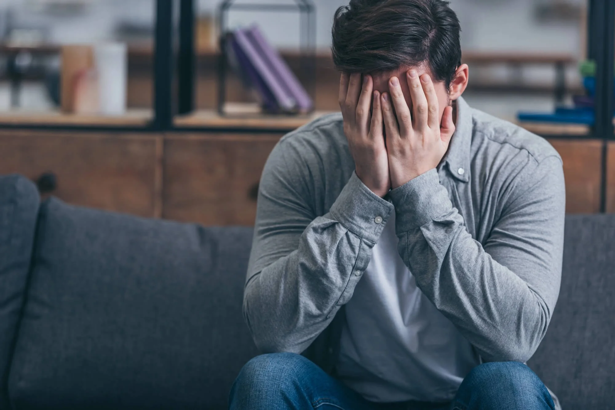 Adult experiencing emotional distress, representing depression therapy and mental health counseling in Dunwoody