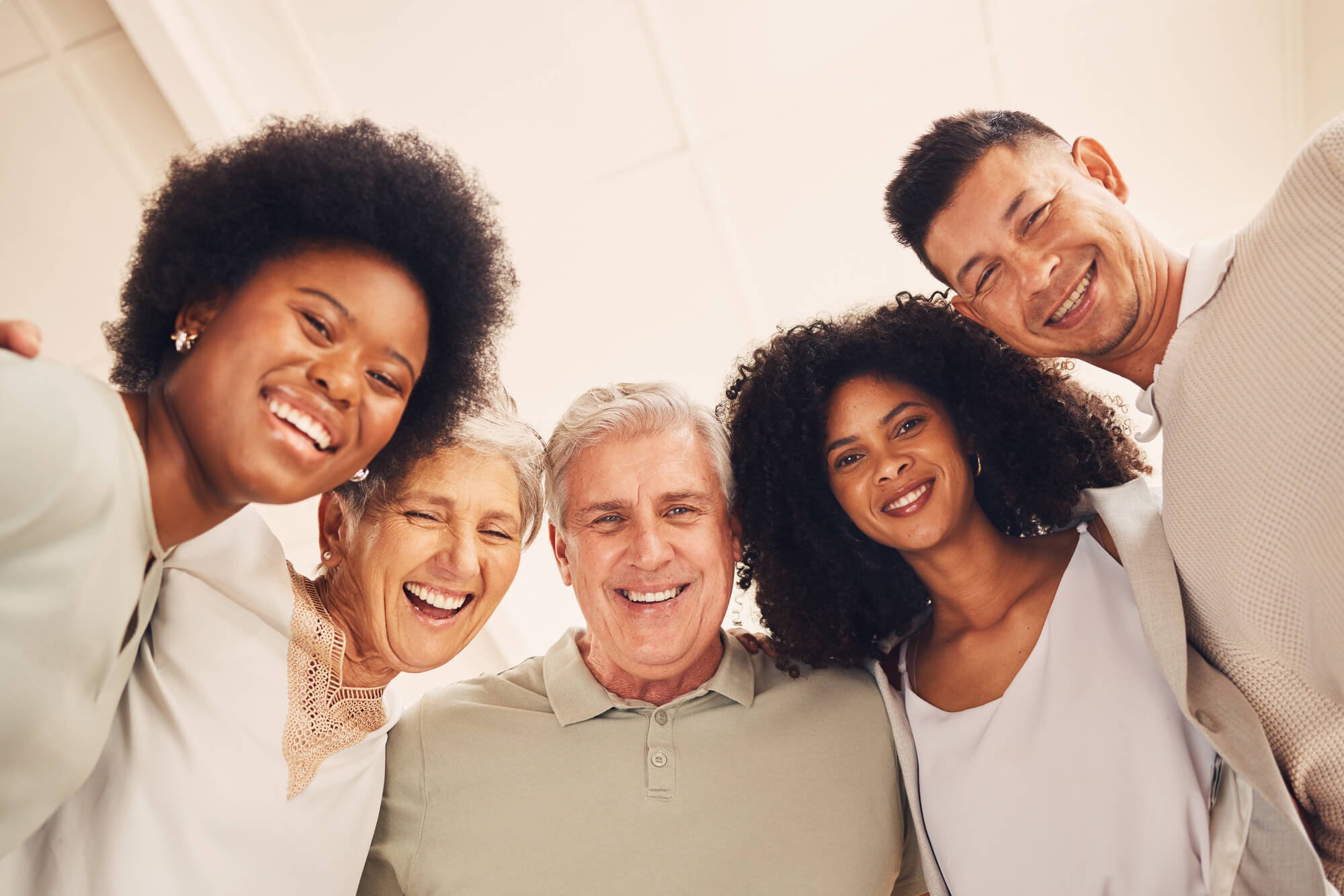 Multigenerational family smiling together, representing family therapy and relationship support in Dunwoody