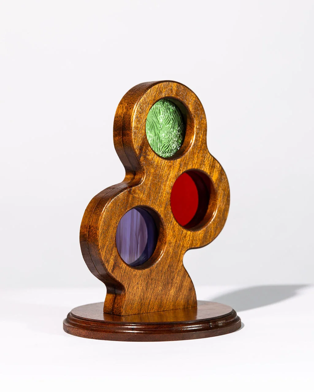 Mahogany11” tall - 8.5” base diameter - 1.5” wide$200 (includes tax/U.S shipping)August (lime green/peridot)January (deep red/garnet)February (purple/amethyst)All birthstone colors available and pillars are also available with four circles ($225), f…