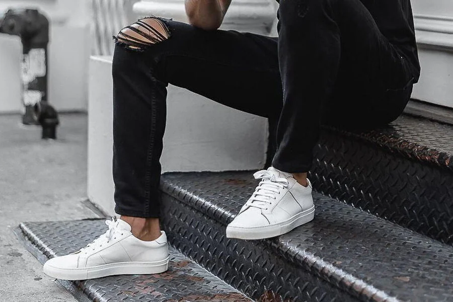White-Sneakers-with-Black-Jeans.jpeg