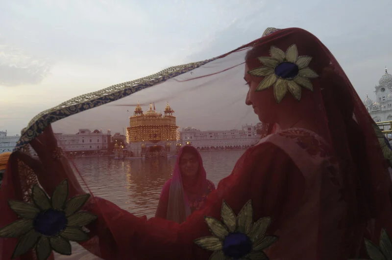  Girls wearing their festive best at at Golden Temple 