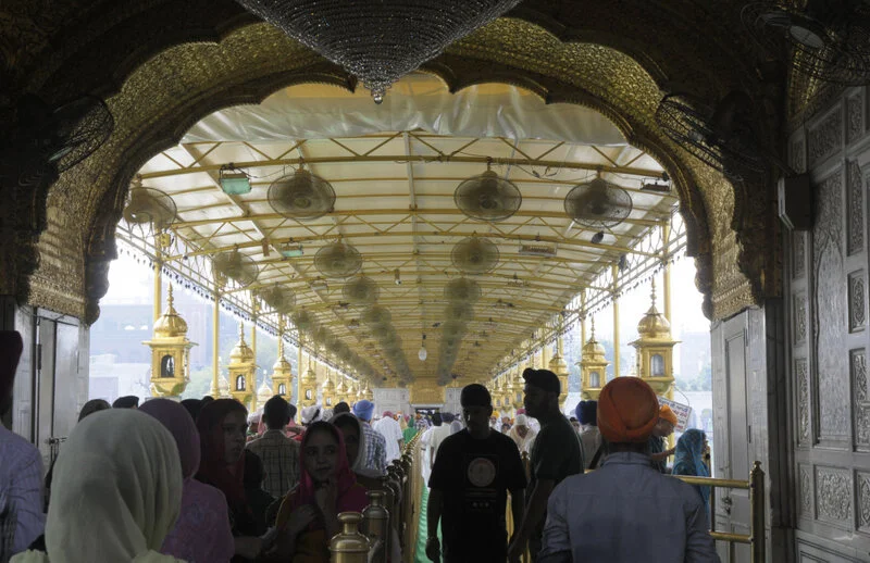  The causeway is now covered to protect devotees from direct sun while entering Harmandir Sahib. 