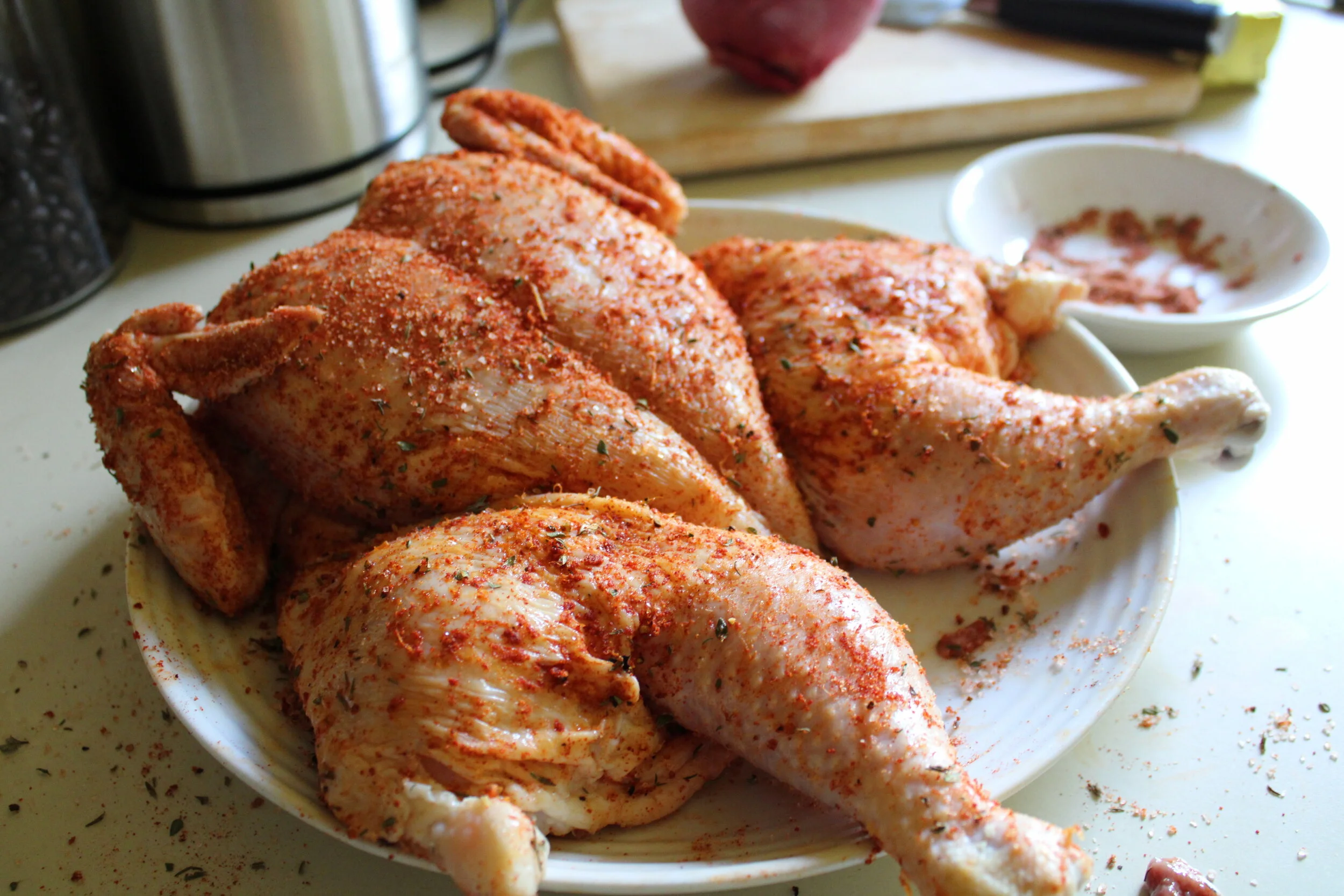 Get the spices underneath the chicken on that thigh and rib meat too.