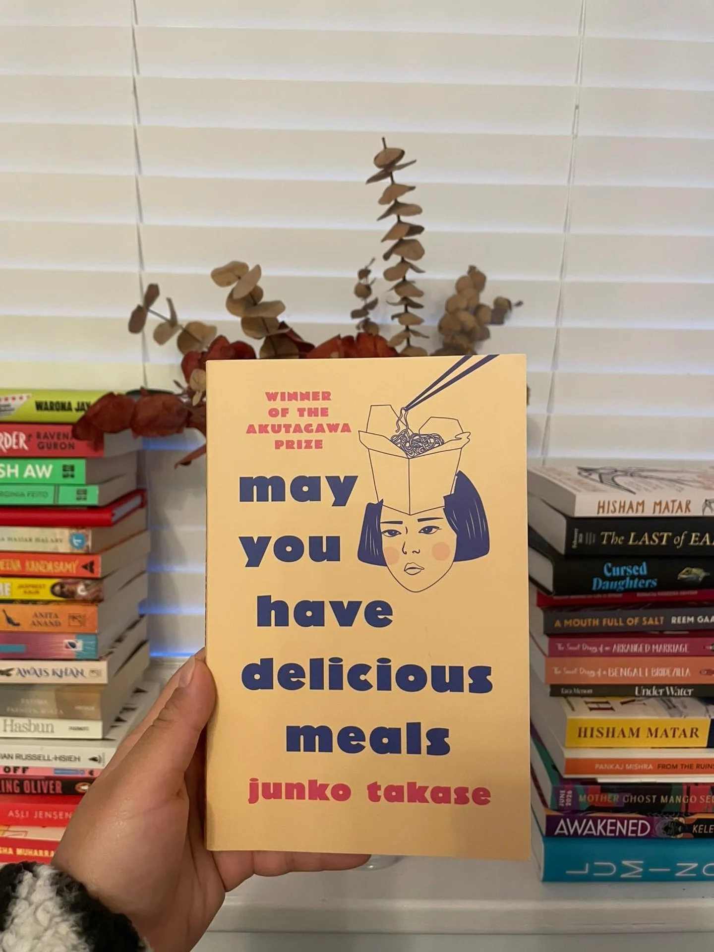 Review from @ostomateforlife: 
May You Have Delicious Meals by Junko Takase 
📗📗📗📗

A quirky translated novela about workplace dynamics especially focused around food. 

Nitani recently moved to a new branch in a packaging design company in Japan 
