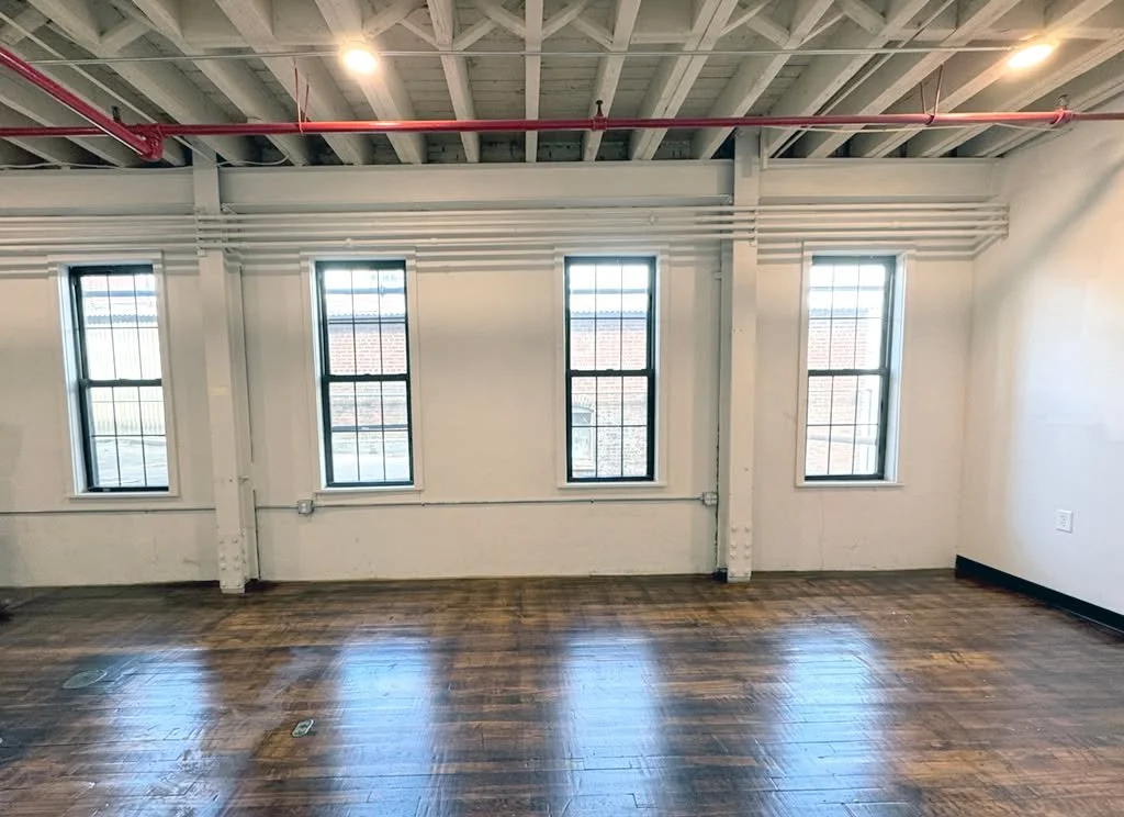 Suite 1205 | 500 Sq. Ft. | $565/month | Available Now

Sunlit Studio Space Now Available!
This bright and inviting second-floor suite features beautiful hardwood floors, abundant natural light, and an open layout perfect for a creative studio or smal