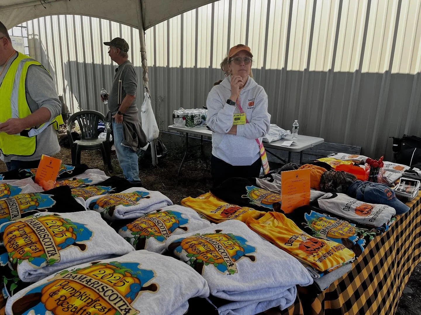 This is Wendy last week when we had lots of merch! But now we are ALMOST SOLD OUT. If you need a Fest Tee shirt, your last chance is Monday am at 9:00 - Wendy is done as soon as the last one sells!