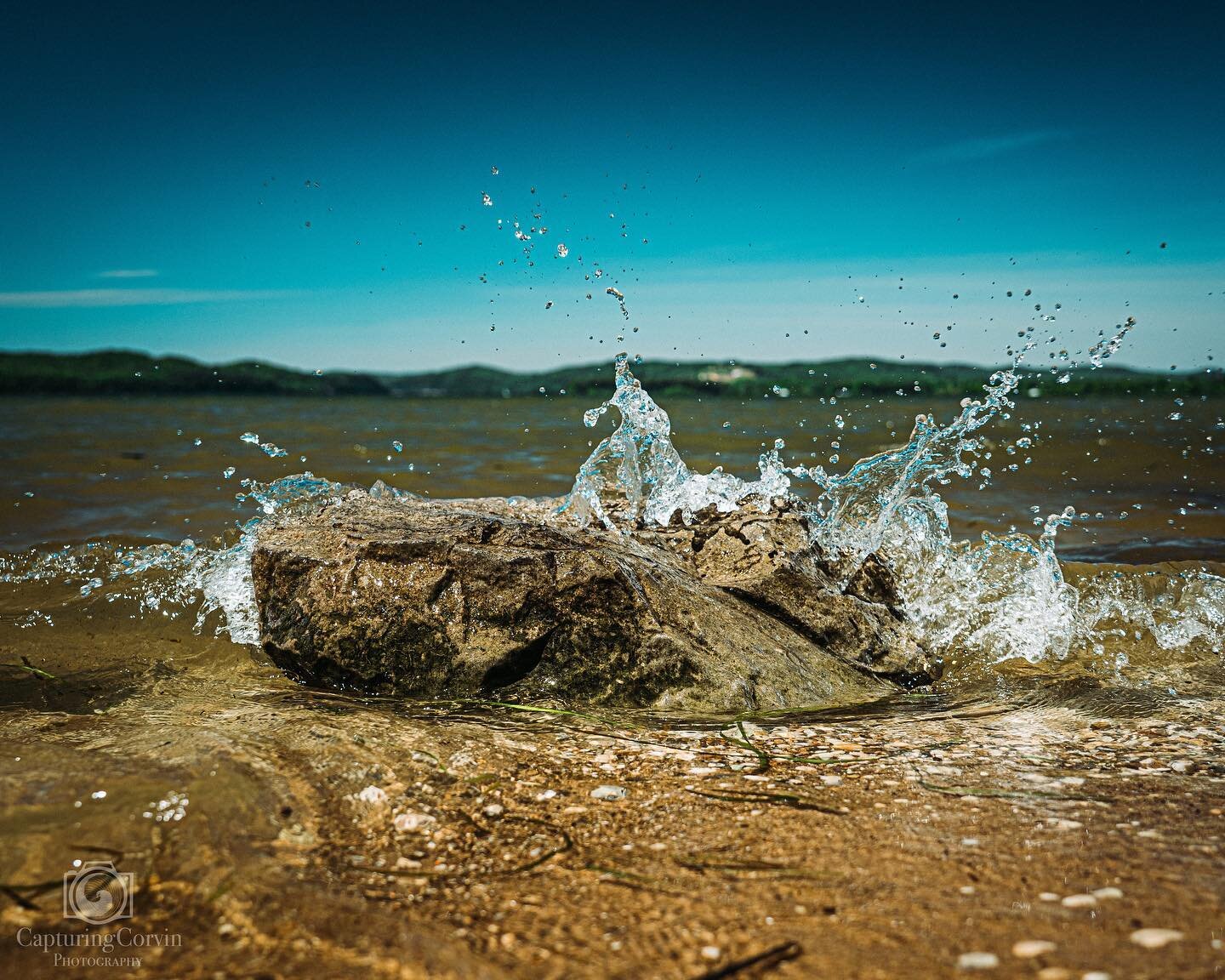 Went to Guntersville a while back and took some new photos. I noticed something familiar about this shot and I think I&rsquo;ve figured out what it is.  Is it just me or does it look like a little water superhero is landing on the rock? Ironman?
.
.
