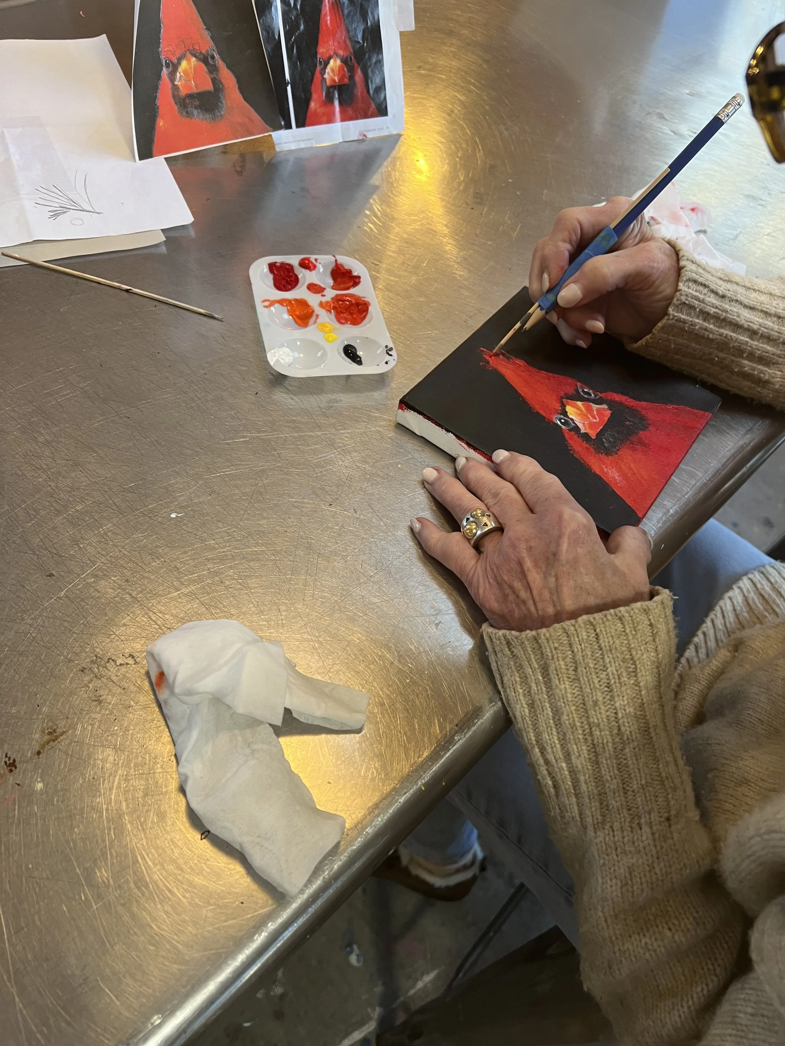 painting the cardinal.jpeg