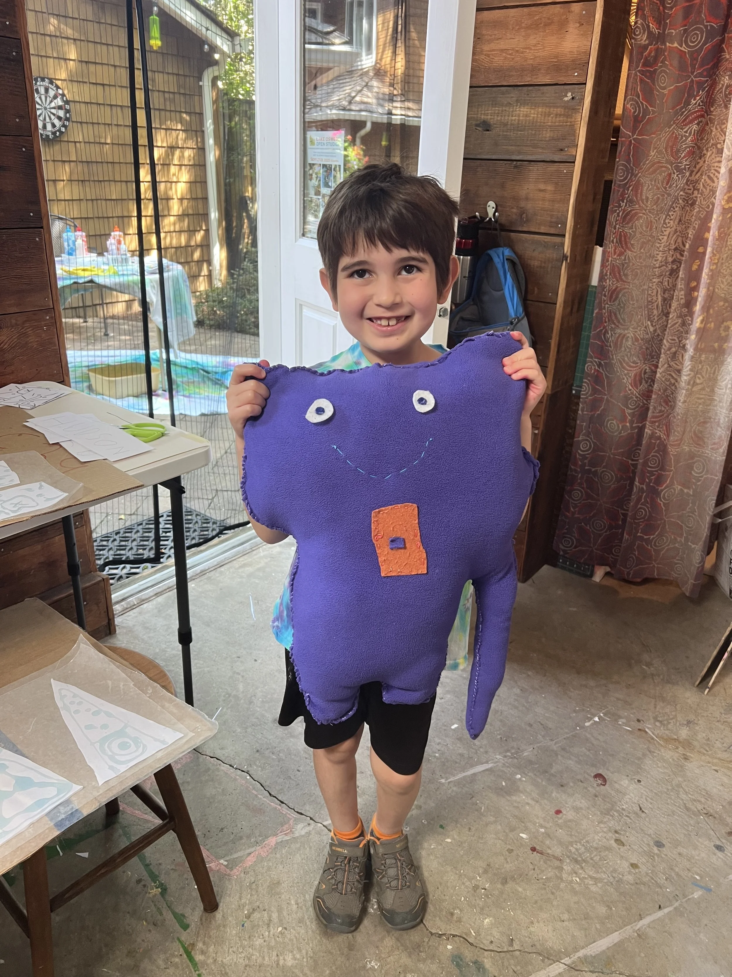 Damian with stuffy.jpeg