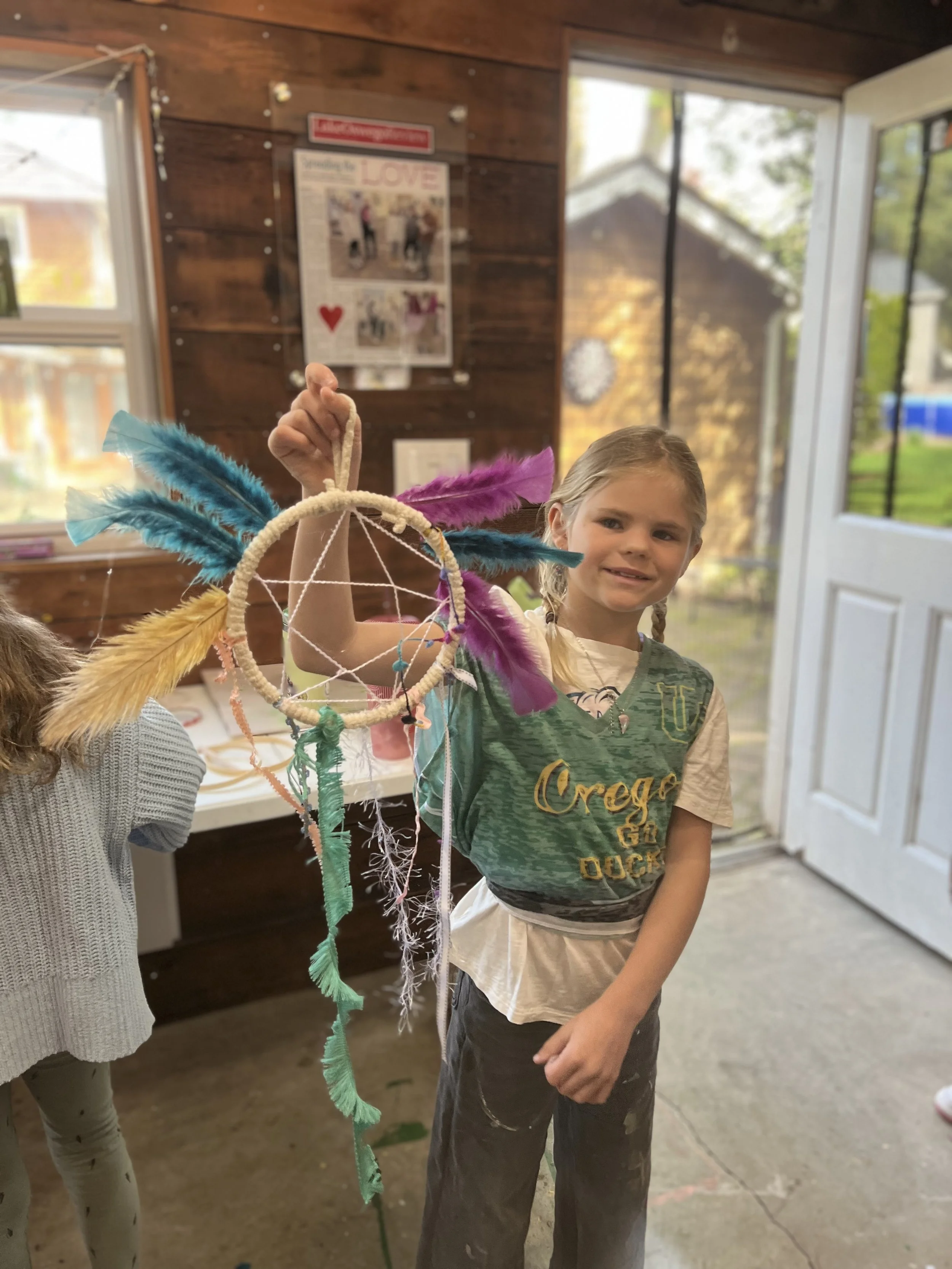 kiddo with dream catcher.jpeg