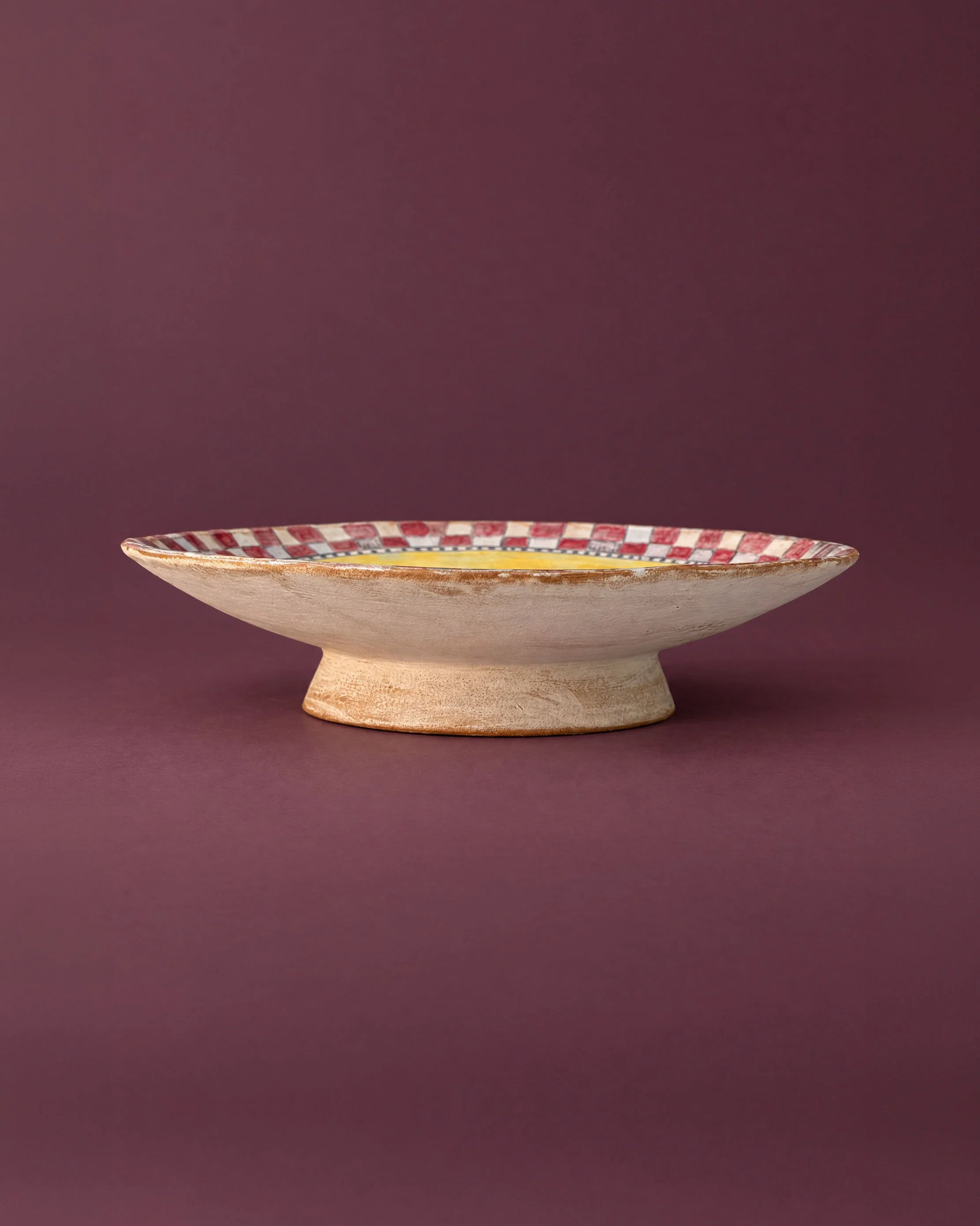 tina_ceramic_yellow_bowl_profile_claret_4x5.jpg
