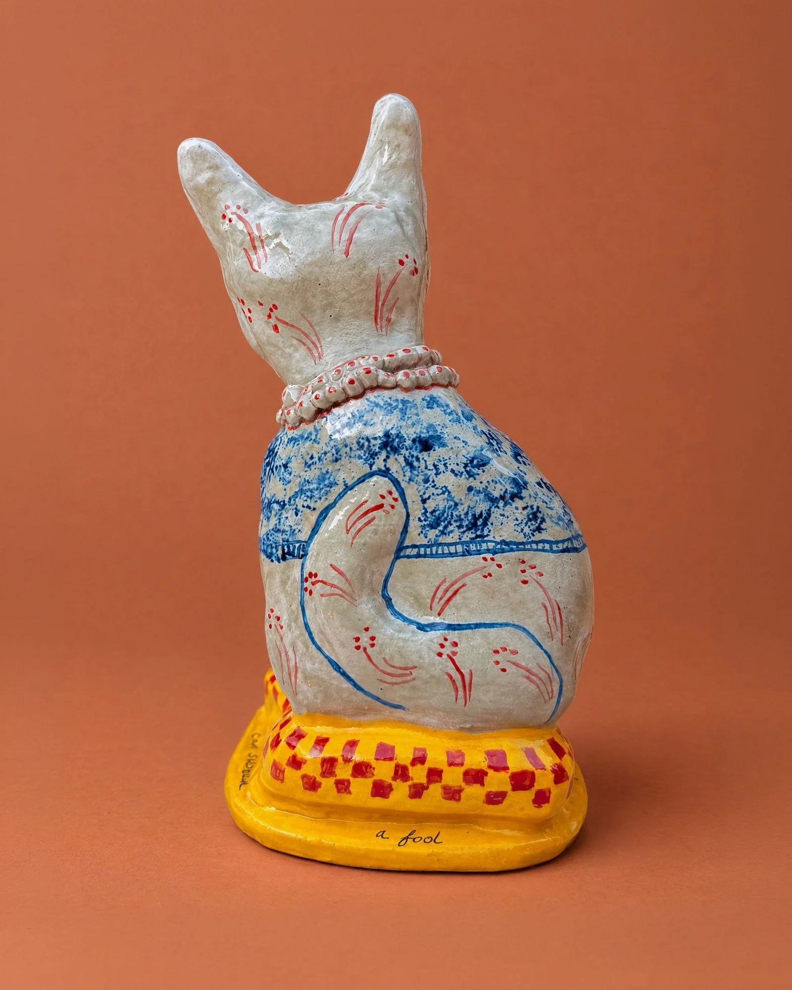 tina-charad-blue-shawl-cat-threequarter-terracotta_4x5.jpg