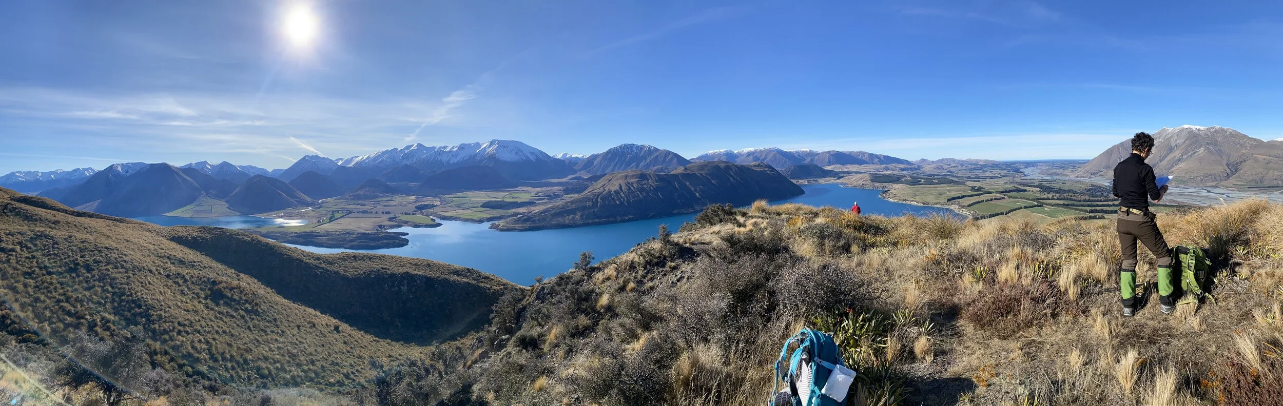 Coffee-break panaoramic views of Lake Coleridge with Liz practicing her navigation skills.