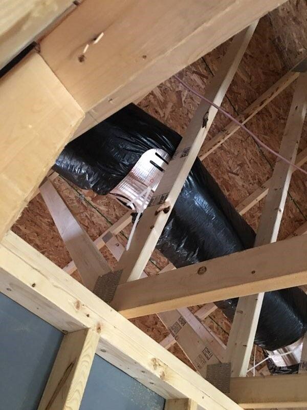 Insulated flex duct installed with a Thermopan flex duct saddle