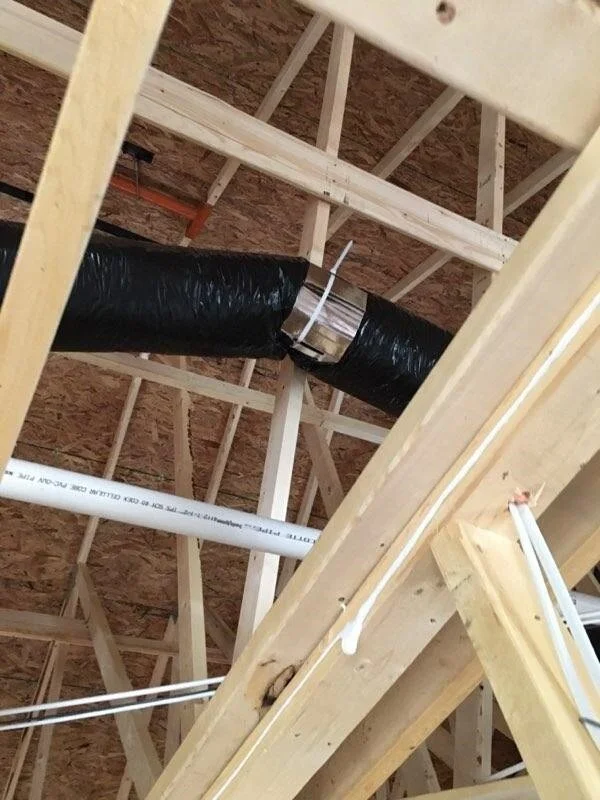 Insulated flex duct installed with a Thermopan flex duct saddle
