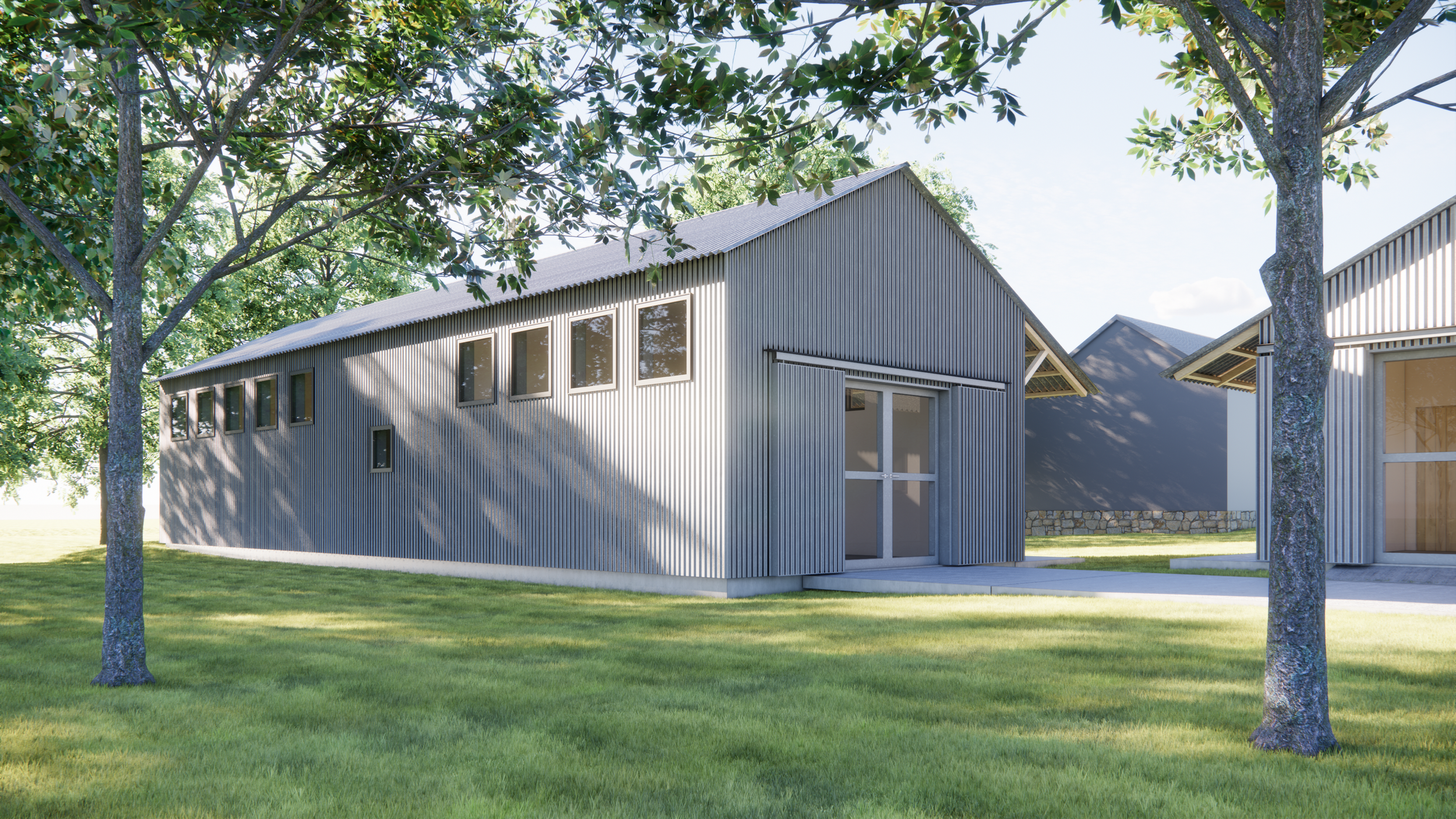 Corrugated steel artist studio with barn doors